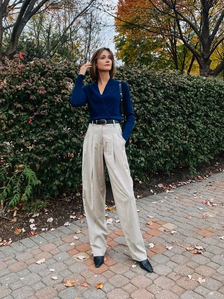 This navy cashmere wrap sweater is ridiculously soft and ridiculously versatile. Pair it with pleated trousers and kitten heel boots for work! #brochuwalker @brochuwalker

#LTKstyletip #LTKover40 #LTKworkwear