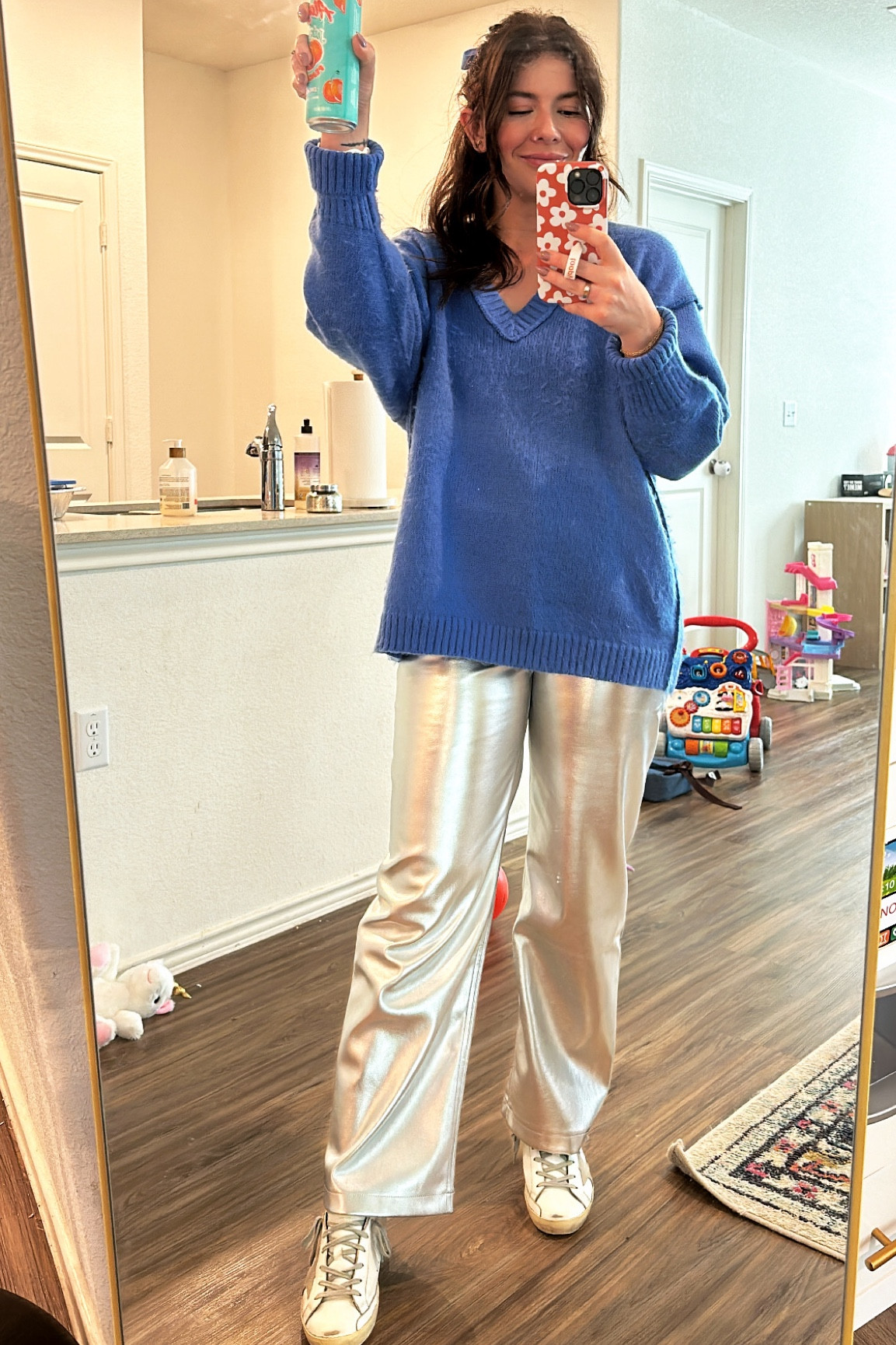 Influenced by dress up buttercup to get these silver pants!! A caffeinated cheers to all the parents out there, we survived!! 🫡🤩

Pants - 28S 
Sweater  - M 
Shoes - 37 (I’m typically 7.5)


#LTKsalealert #LTKSeasonal #LTKHoliday