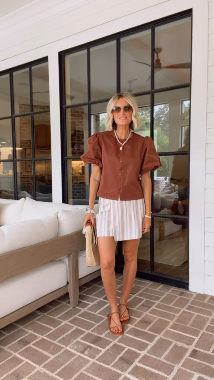 This brown top is actually an Amazon find! I love the puff sleeves! It pairs perfectly with this brown and white striped skort! Wearing S in top & XS in the skort!

Loverly Grey, Amazon, Target, finds under $50, summer outfit 

#LTKSeasonal