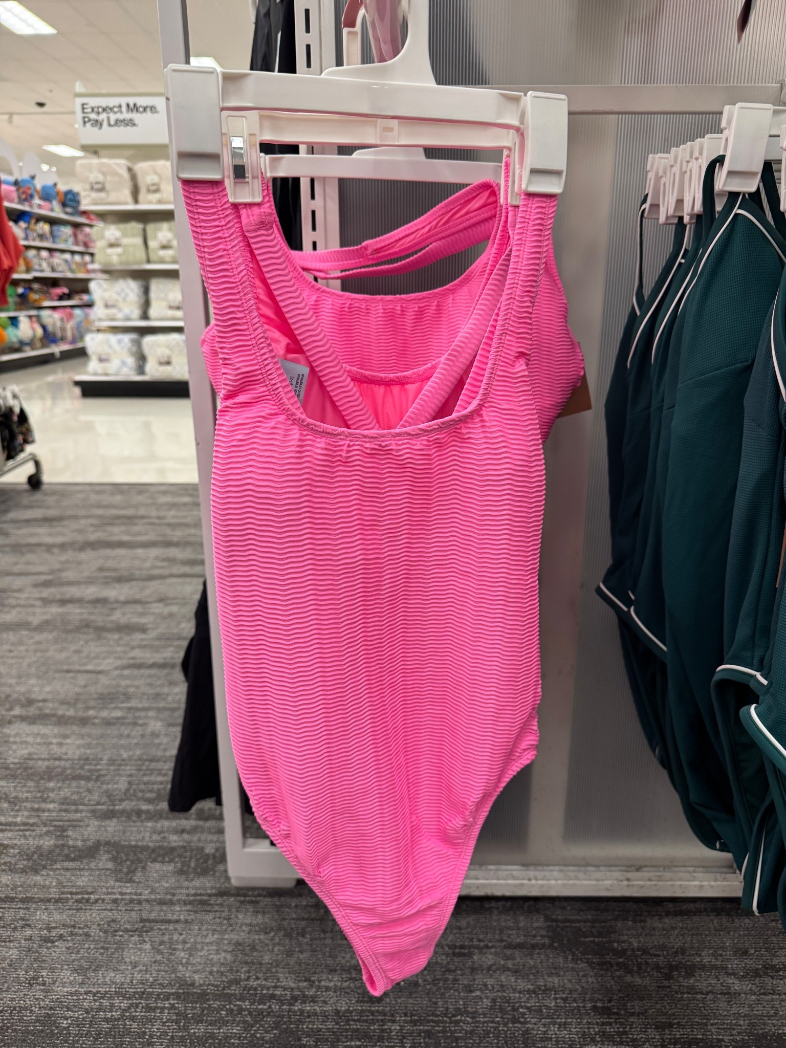 This bright neon pink textured one piece swim suit looks like Cupshe. Affordable swimwear, summer fashion, vacation/ready. 

#LTKOver40 #LTKTravel