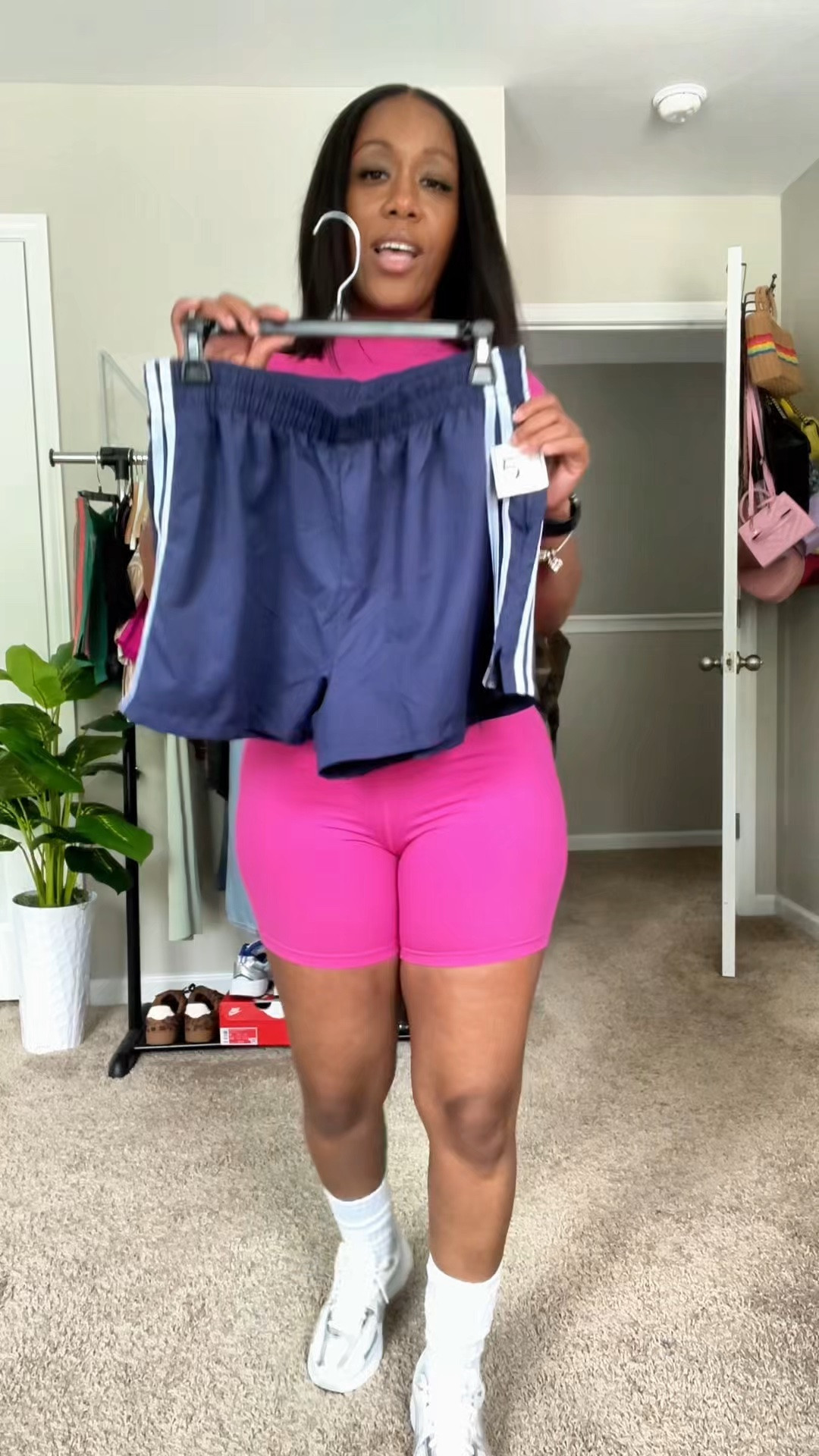 I picked up these nylon shorts last year from five below, let’s put together an outfit.

I styled these navy shorts with a beige and navy Brooklyn graphic tee BUT here’s where I need help, which sneaker should I wear with this casual outfit? Jordan 5 or Jordan 1

#LTKootd #LTKPetite #LTKOver40