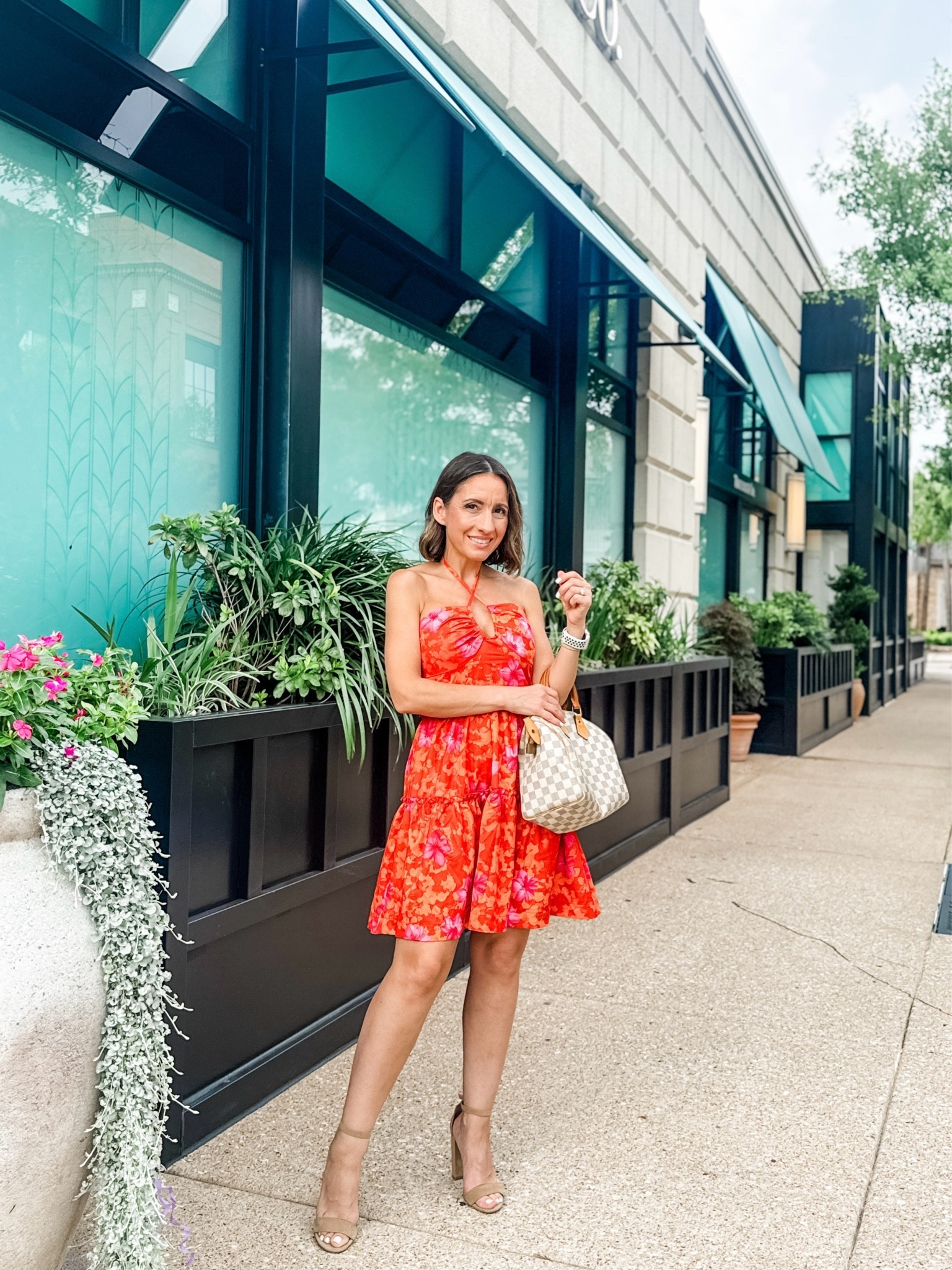Floral dress with the prettiest ruffle detail. 
Dress runs true to size. Wearing a small. 
Date night outfit. Floral dress, neutral colored block heels, and summer handbag. 
Petite style 
Petite outfit 
Girls night out dress

#LTKootd #LTKPetite #LTKOver40