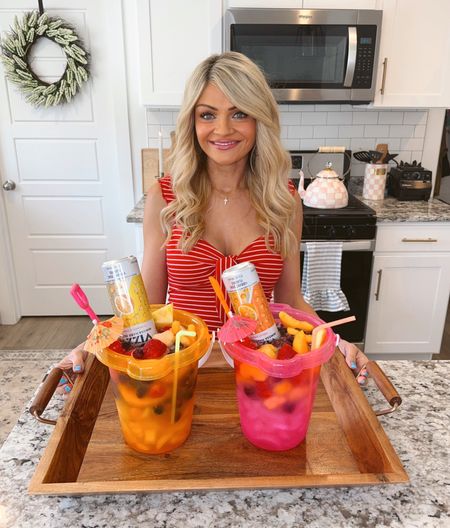 Here are some links to my sand bucket/drink pails along with my tray from Target, drink umbrellas, re useable ice cubes, and some inspired outfits. I got this top and shorts last year so i linked some others! 

#LTKSaleAlert #LTKFindsUnder50 #LTKHome