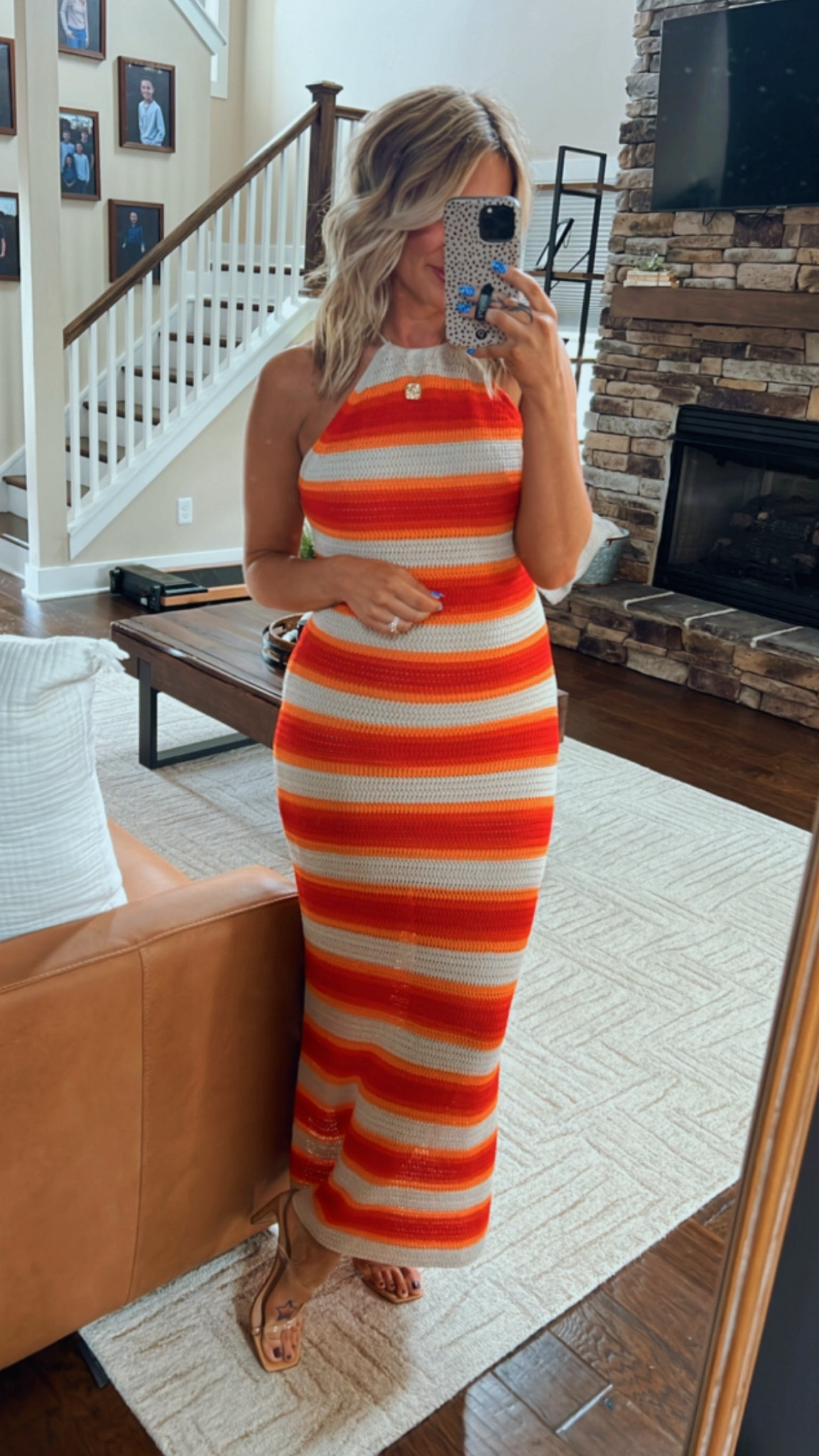 This halter striped sweater maxi dress is super stylish and super affordable! I paired with my favorite nude sandals from Amazon but this outfit can be dressed down too. Pair with a jean jacket or leather jacket! Comes in white and black dresses too. Orange striped dress, summer outfit, beach vacation, beach dresss

#LTKparties #LTKSeasonal #LTKfindsunder50