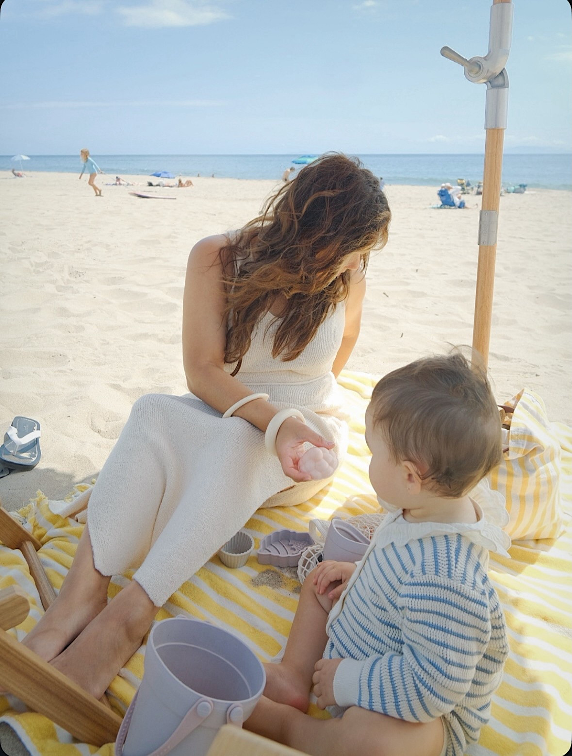 You look happier” - Thanks. Beach day + cute outfits + sun rays + my tiny bestie = :) 

dress: @frenchconnectionus x on @shop.ltk