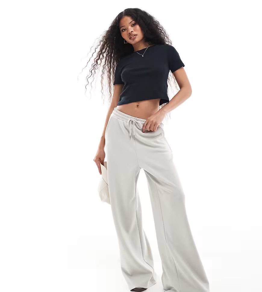 Stradivarius Petite soft touch wide leg sweatpants in light gray | ASOS (Global)