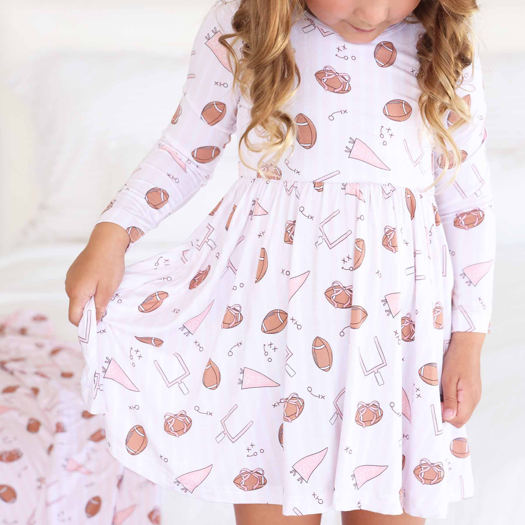Long Sleeve Twirl Dress | Tiny Touchdowns Pink | Caden Lane