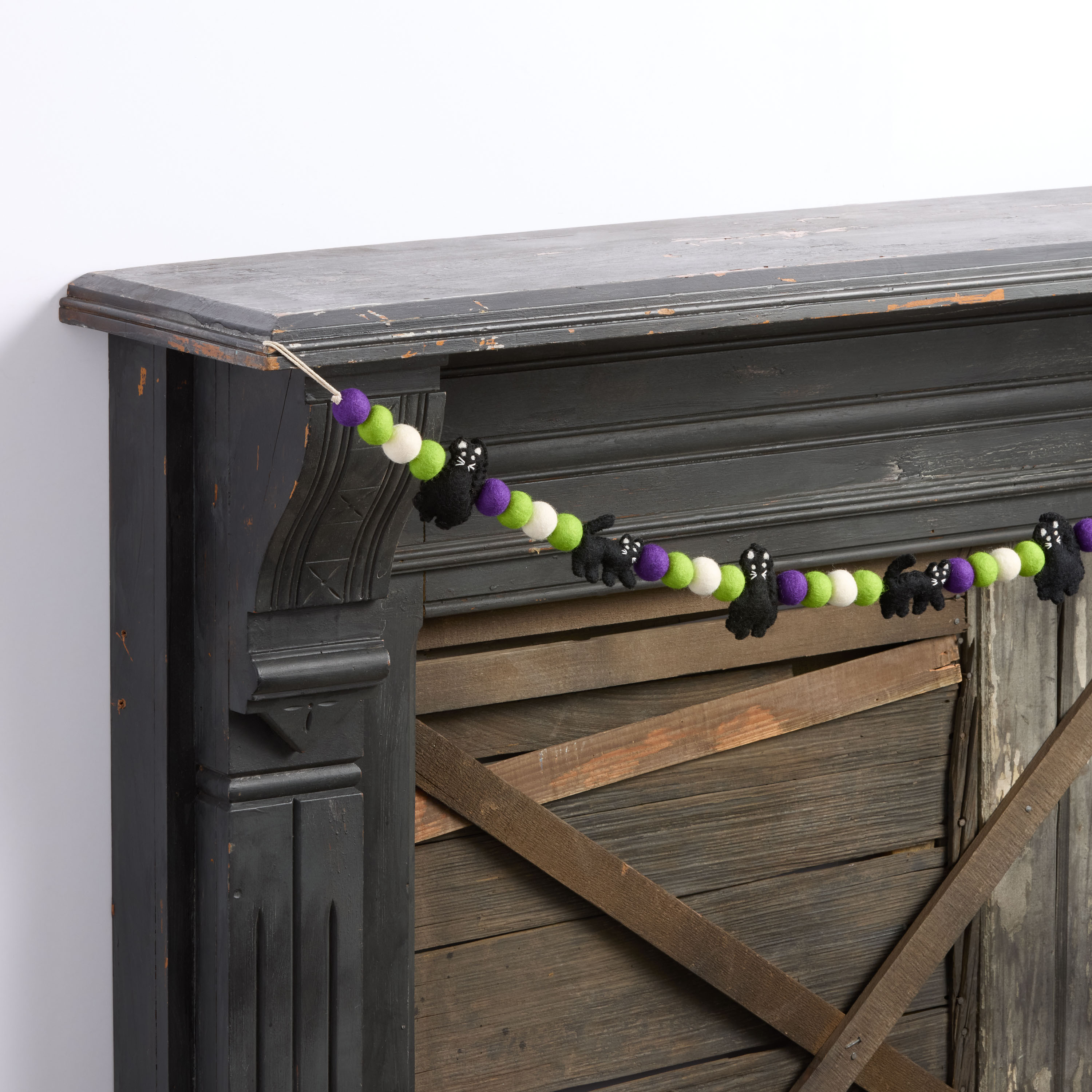 Purple and Green Wool Halloween Cat Pom Pom Garland | World Market