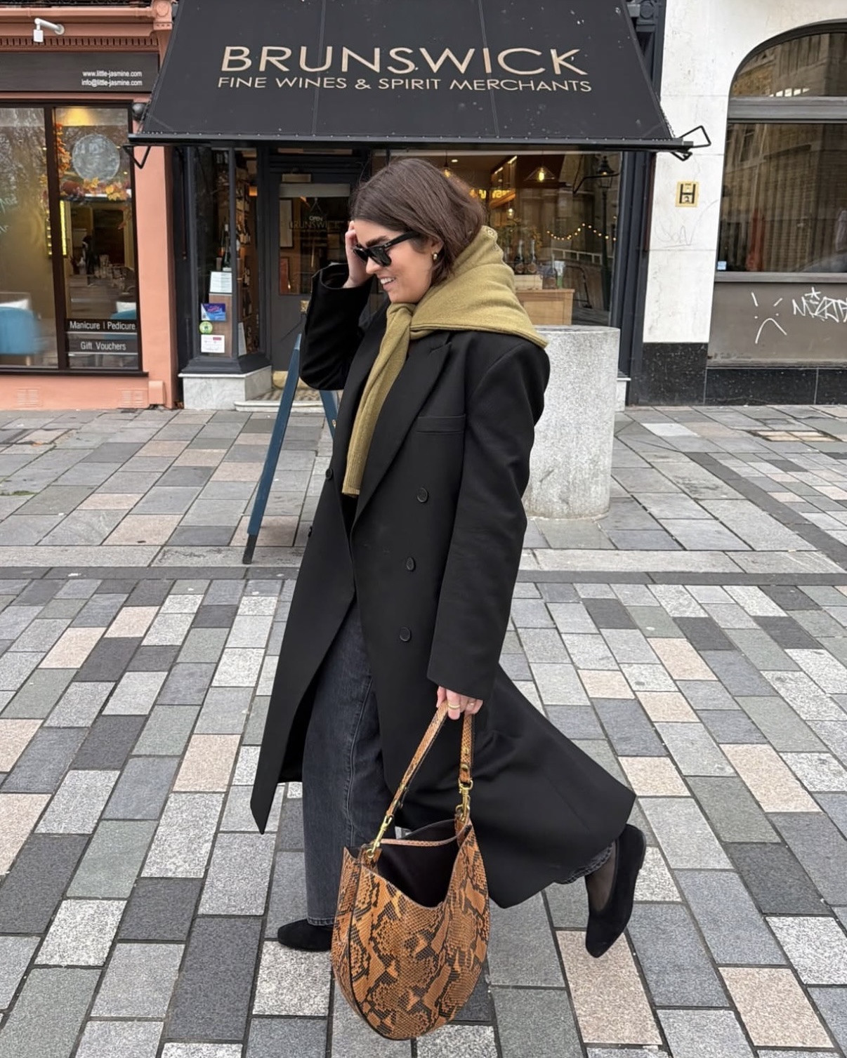 Elevating a black coat with a pop of green. Cardigan from J.Crew and snake print vintage Celine bag, similar items linked

#LTKwinter #LTKstyletip