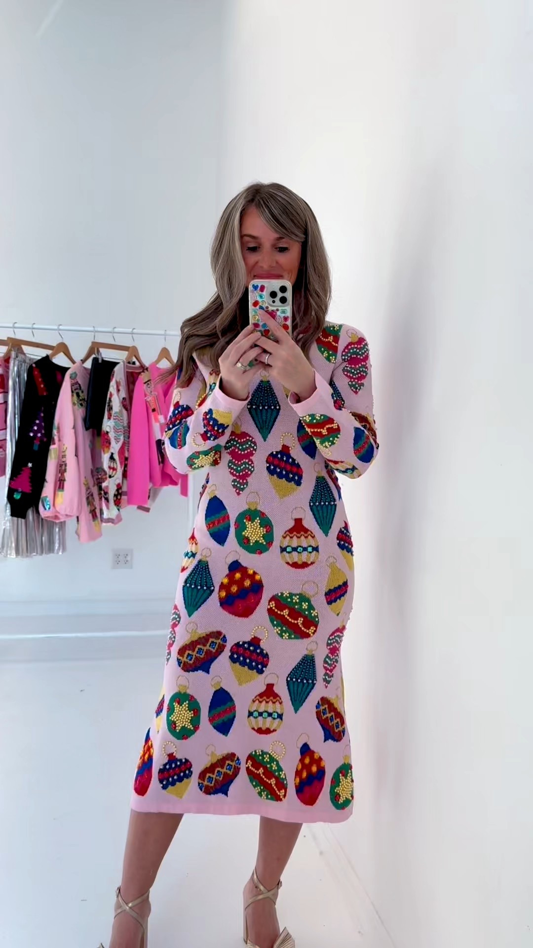 How ADORABLE is this light pink knit midi dress for a holiday party?! Love the beaded and embellished Christmas ornaments and the fit is so flattering! Queen of sparkles / knit dress / Christmas party / holiday attire / sparkles/ party dress / sweater dress / Christmas Eve / mom style : bump friendly 

#LTKSeasonal #LTKHoliday #LTKStyleTip