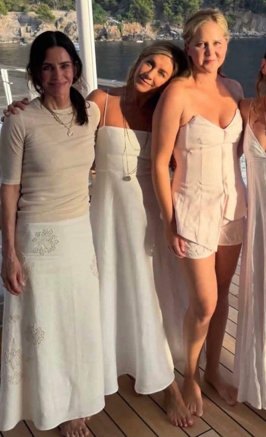 Courtney Cox wearing a white Floral Embroidered A-Line Midi-Skirt