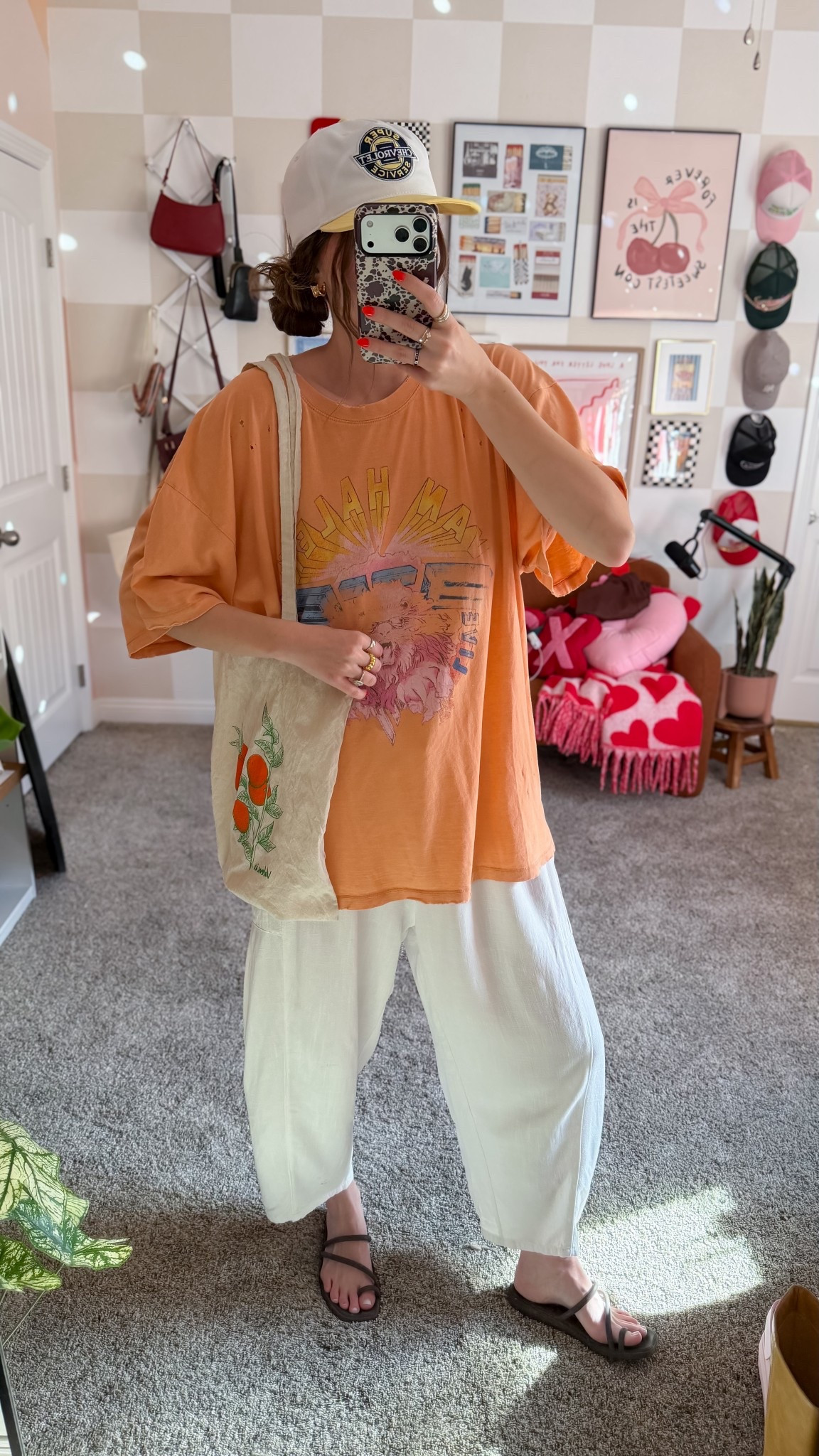 Comfy mom outfit! Wearing size 2XL tee in size medium pants! Hat and tee are from Target. Bag from a street vendor in Valencia.

#LTKmomlife #LTKootd