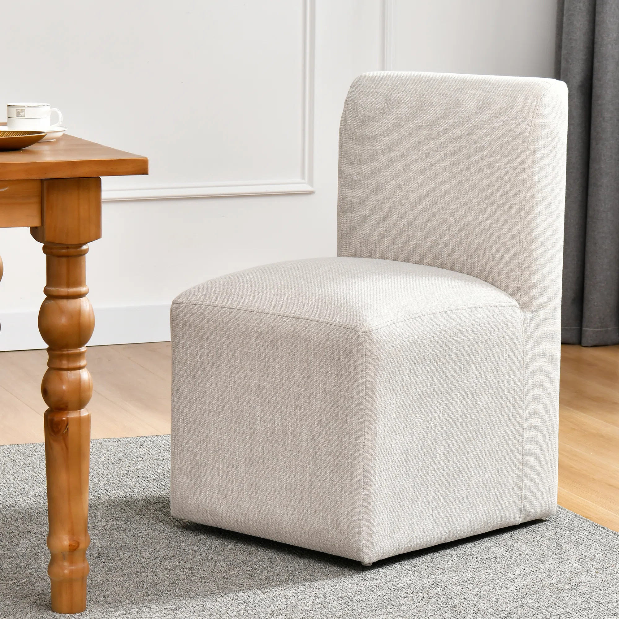 Ritney Down Fill Modern Dining Chairs Casters Parsons Chair | Wayfair North America