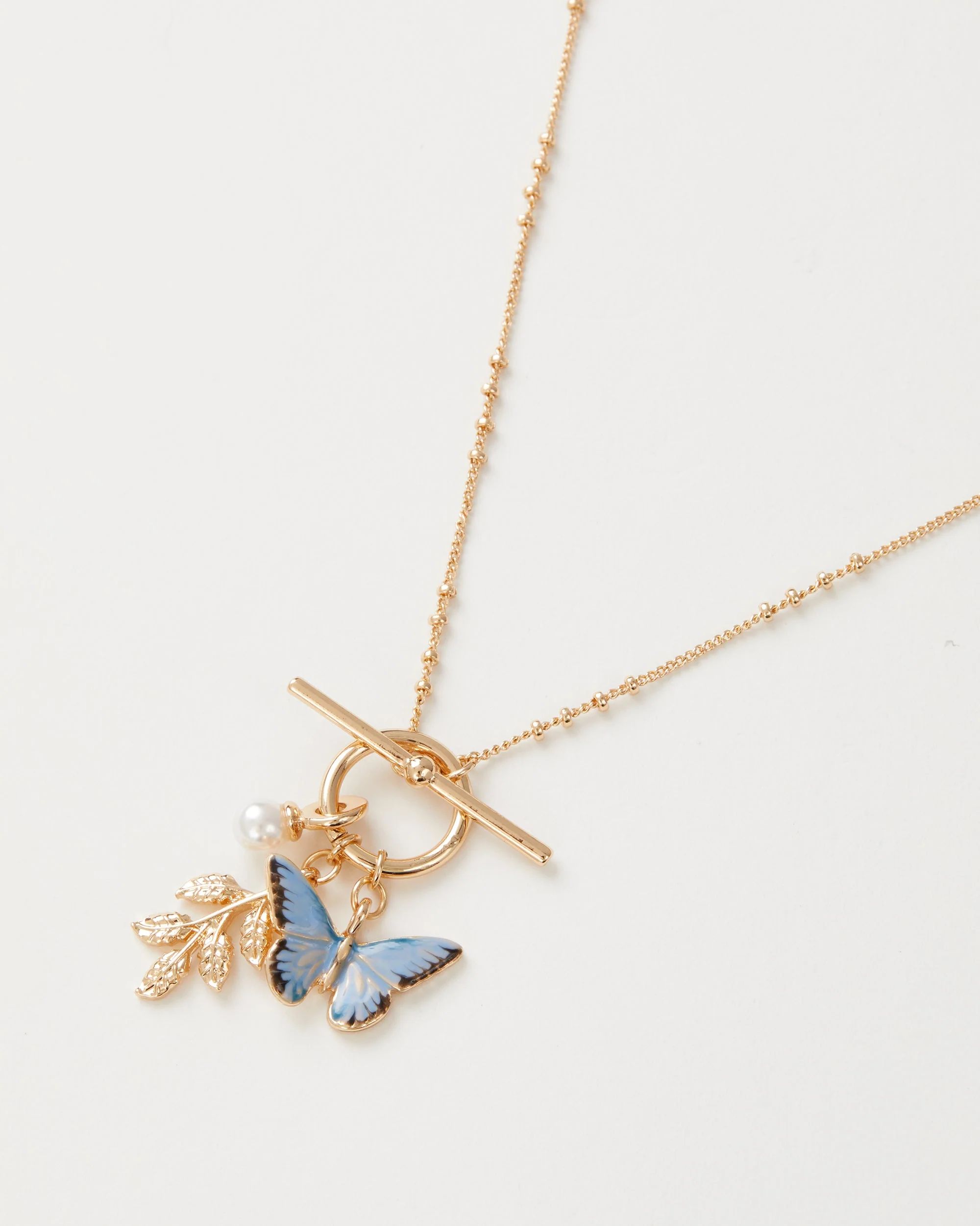 Enamel Blue Butterfly & Leaf Charm Necklace | Fable England