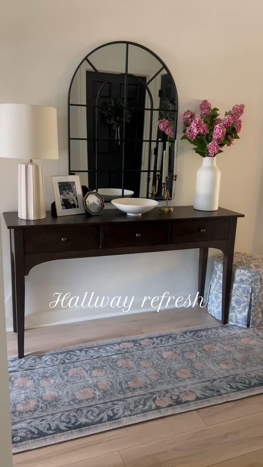Hallway refresh 🖤
New mirror elevates the space and creates more of a WOW factor when you first walk in. 

#LTKFindsUnder50 #LTKHome #LTKFindsUnder100