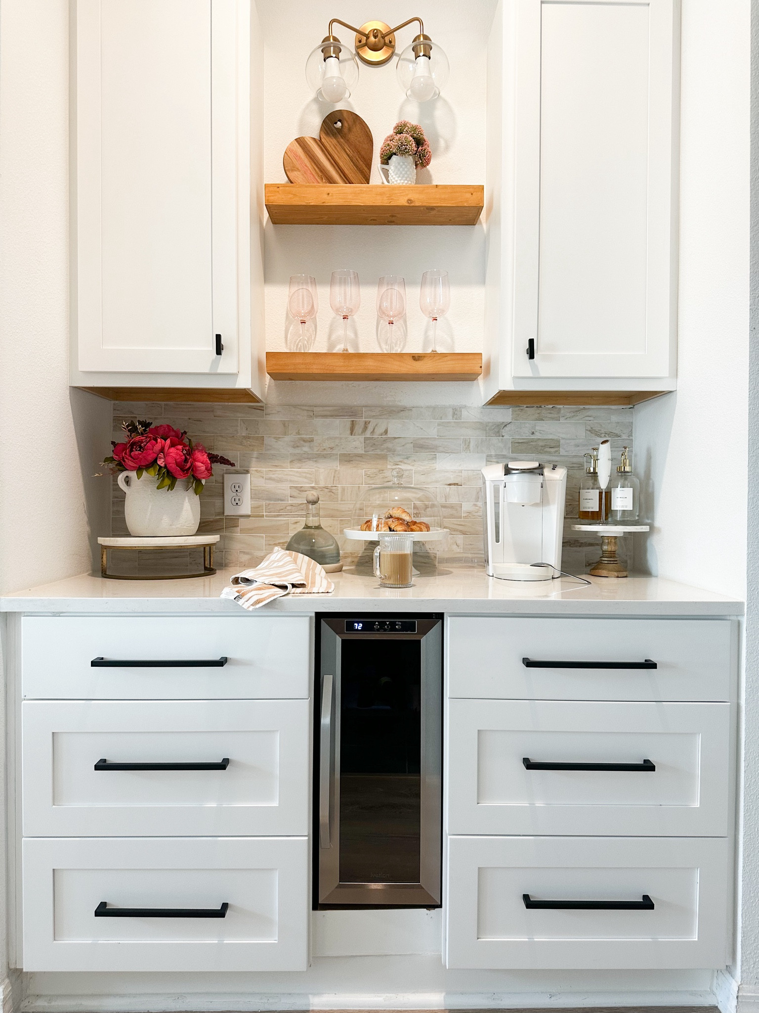 But first, cafecito ☕️💓

Coffee bar • dry bar • valentines decor • valentines ideas • coffee • syrup bottle pumps • backsplash • white cabinets • black drawer and cabinet pulls • white coffee machine • neutral home decor • home interior 

#LTKhome #LTKMostLoved