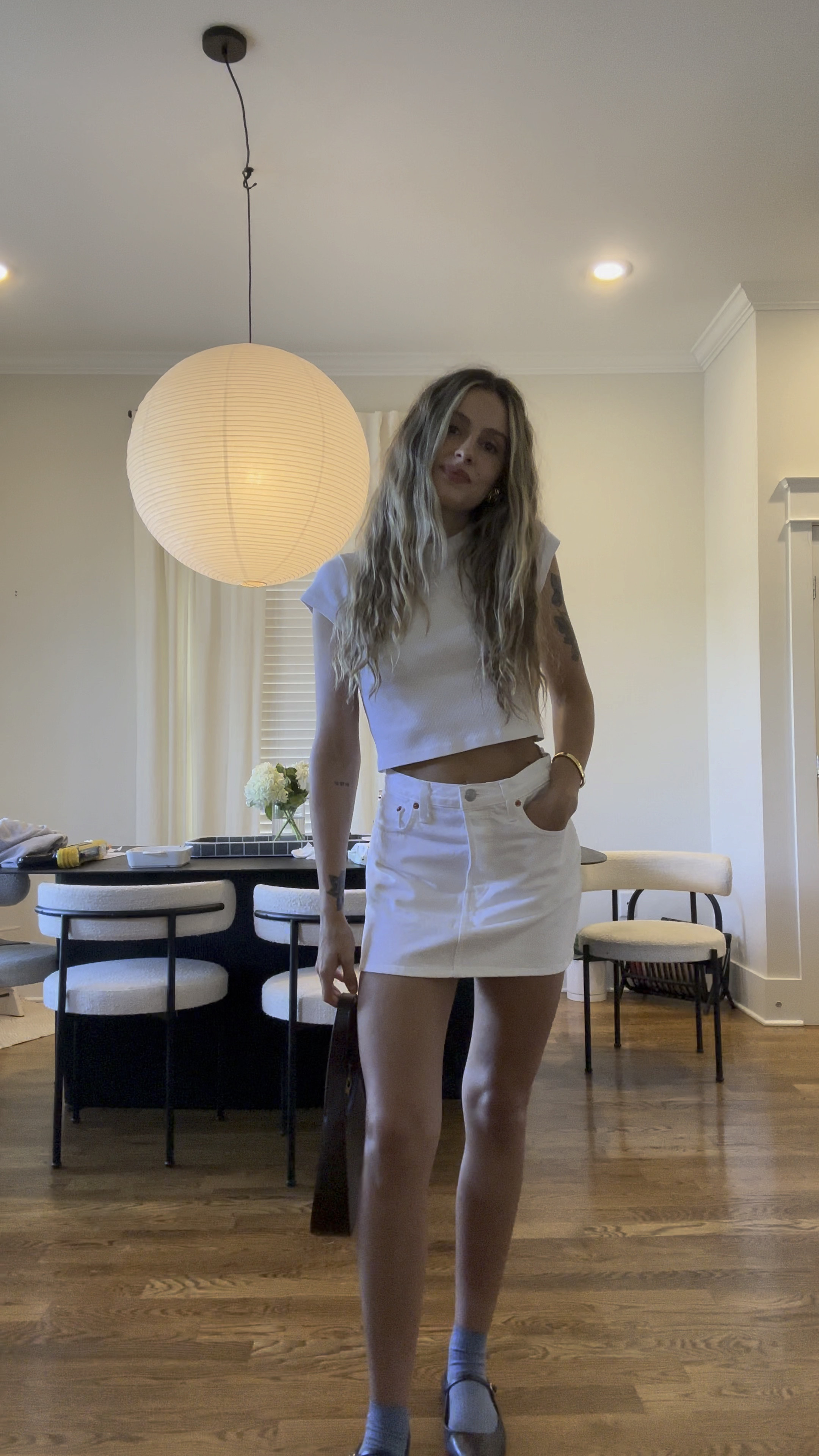 OOTD feeling the all white lately. 
Skirt is RE/DONE. Shoes are Zara 🤎