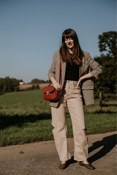 Plaid wool blazer from Everlane with cut out cowgirl jeans from Still Here NY. Sezane crossbody bag and Everlane leather flats. Jeans outfit. Blazer outfit  

#LTKshoecrush #LTKitbag
