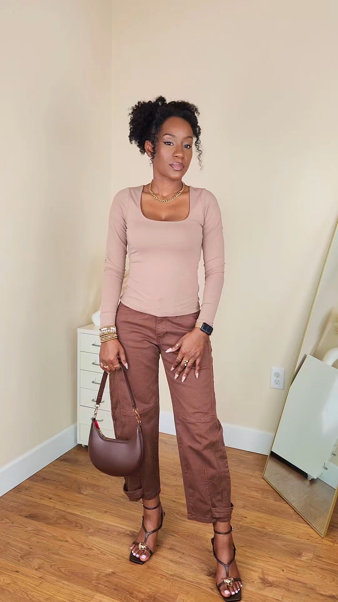 Today's outfit of the day is an all brown monochrome outfit and it's the definition of elevated neutral style. A fitted long sleeve top paired brown barrel pants creates a sleek, flattering silhouette. I styled this look with a matching brown shoulder bag, gold accessories, and strappy heels for a polished finish. Perfect for date night, brunch, or a classy everyday look. 

#LTKgrwm #LTKootd #LTKSaleAlert