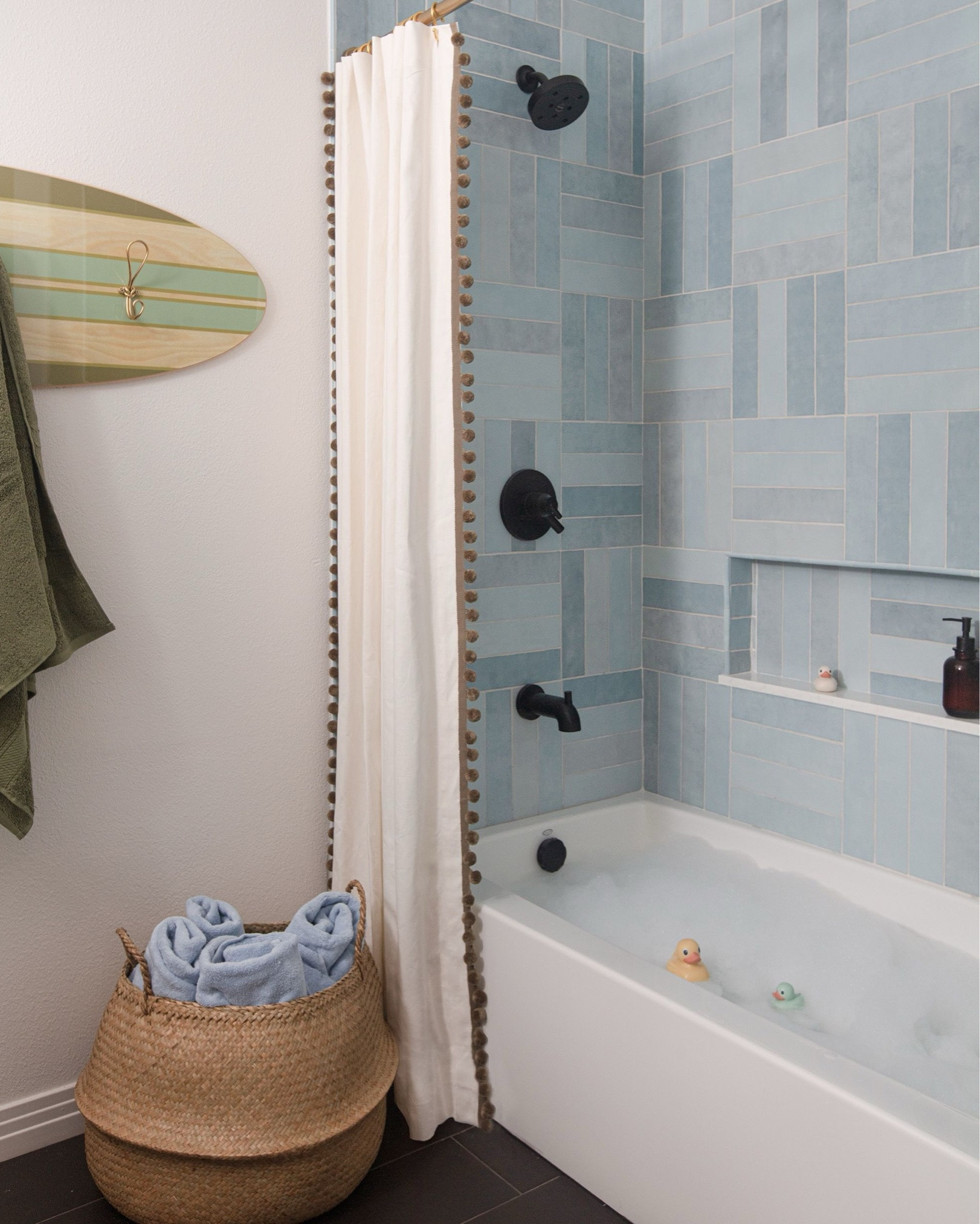 A before and after worth swiping for...🏄️⁠
⁠
We L-O-V-E designing kids’ bathrooms and for this vacation home, we went for a playful modern look infused with a dash of iconic SoCal vibes⚡️

#LTKHome