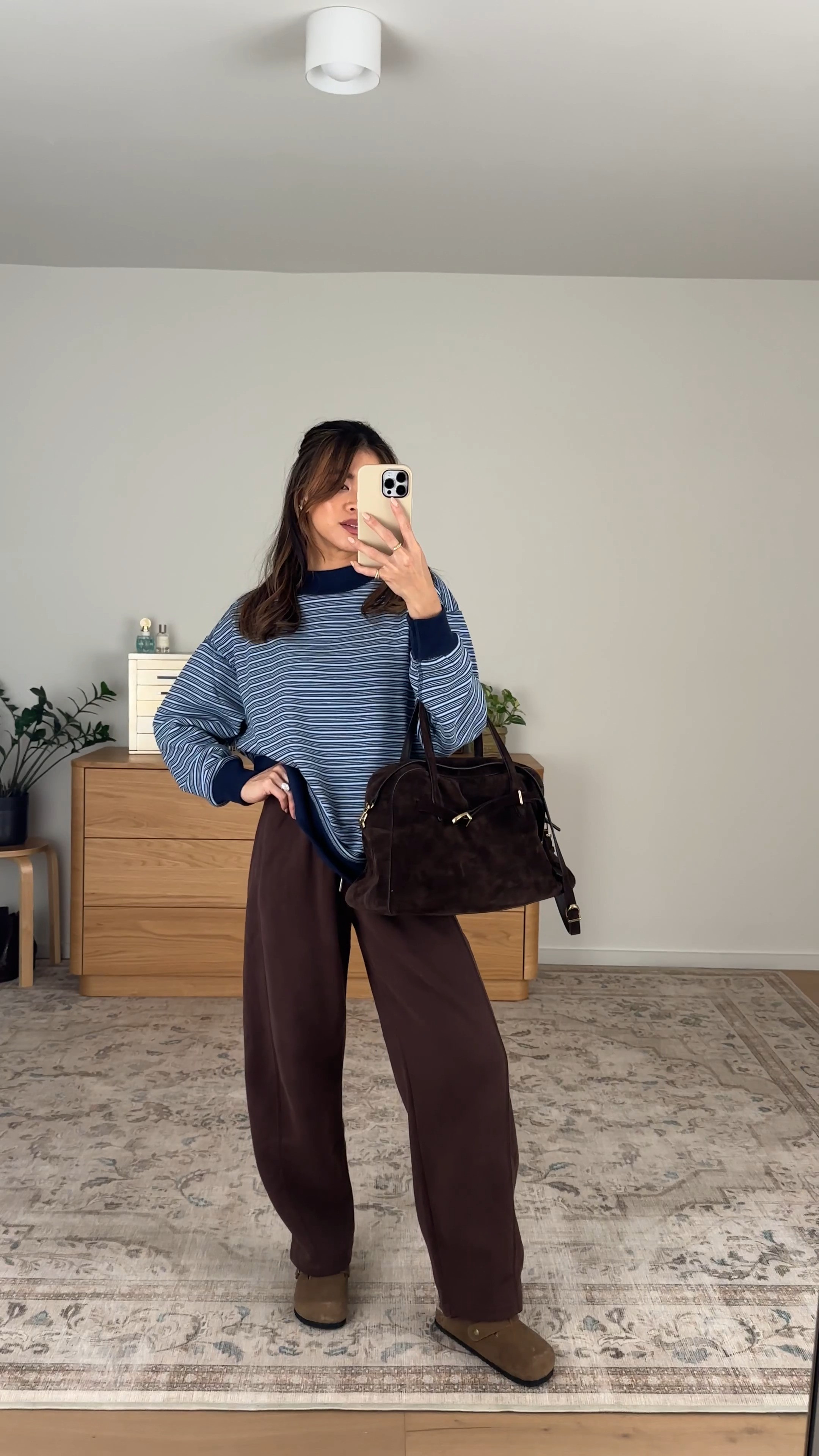 This suede bag from @Madewell is one of my favorites! Perfect fall accessory.

Sizing info:
• Abercrombie YPB On The Go Mock Neck Sweatshirt (Size Small in Navy Stripe)
• Abercrombie Sunday High Rise Forward Seam Barrel Sweatpant (Size XS Short in Black Walnut) 

Fall Abercrombie new arrivals, Abercrombie sweaters, Abercrombie petite pants, Abercrombie petite sweats, Abercrombie fall sweater, Abercrombie petite sweater, Petite style, petite fashion, mom outfit, mom style, petite pants, petite outfit ideas, petite outfits, best pants for petite, petite pull on pants, vacation outfits, fall outfits, fall style, fall trends, fall looks fall outfit ideas, Abercrombie try on, fall sweat pants, fall lookbook, fall outfits, sweatpants, petite sweat pants, abercrombie sweats, barrel leg sweat pants

#LTKootd #LTKSeasonal #LTKPetite