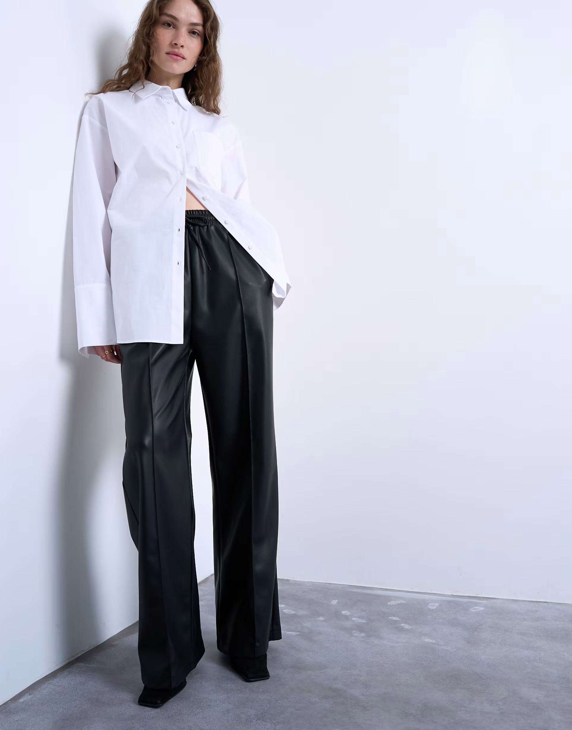 Topshop faux leather wide leg sweatpants with pinseam detailing in black | ASOS | ASOS (Global)