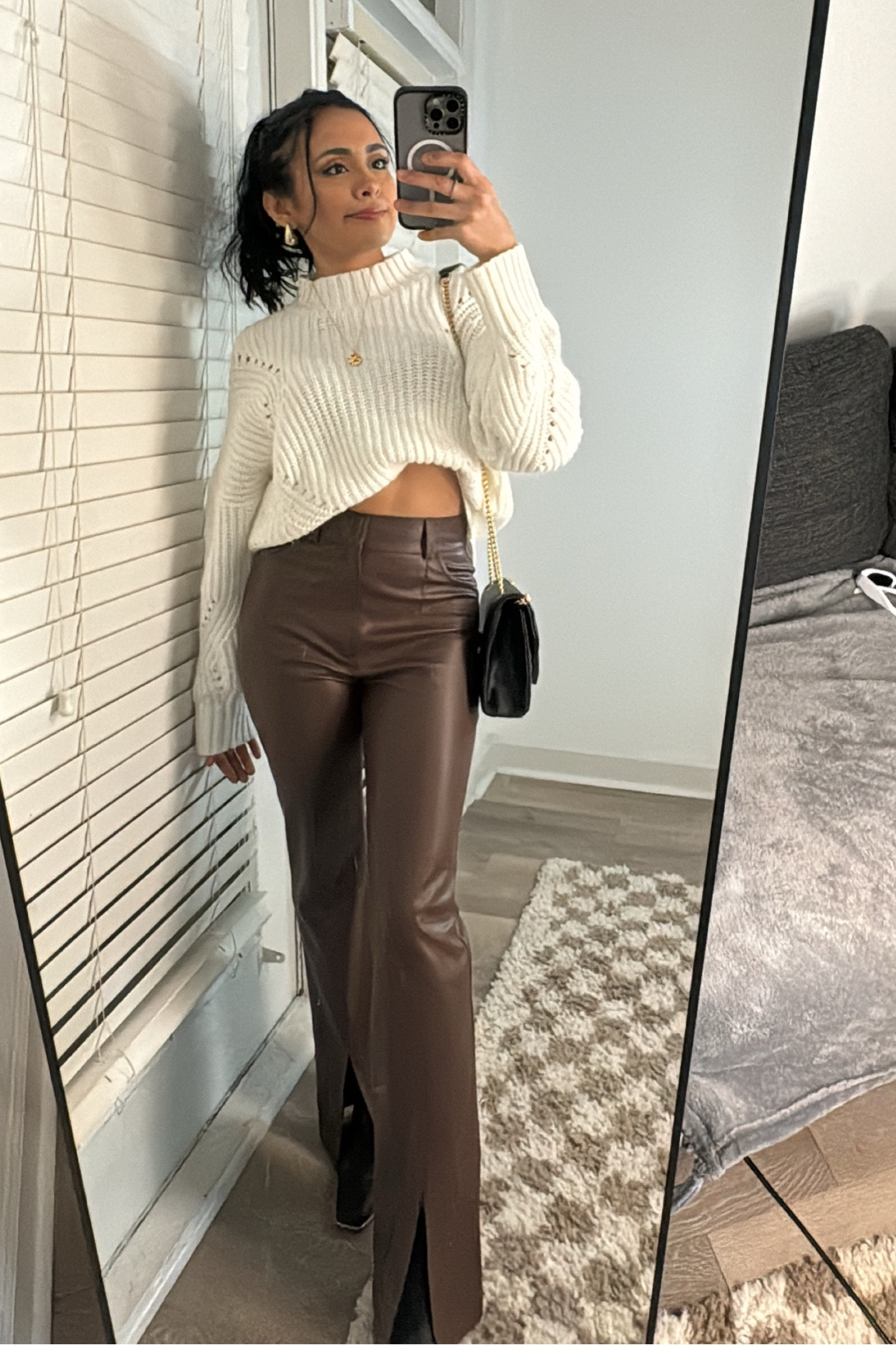 Super comfy dinner outfit for a cold evening, Zara leather pants with a cute cable knit  sweater, black Steve Madden boots, and acute little black purse to match

#LTKstyletip #LTKfindsunder100 #LTKSeasonal