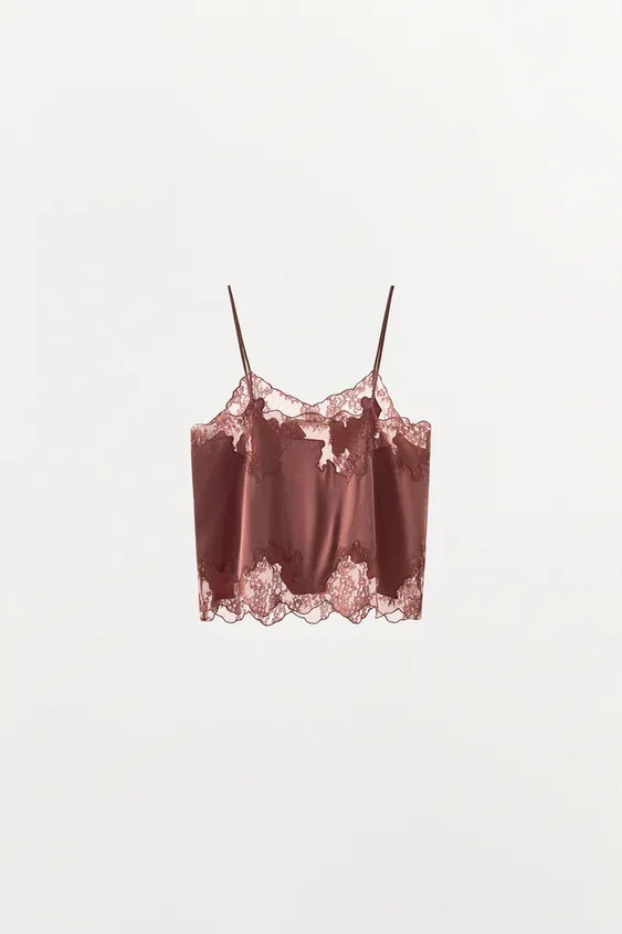 Model height: 178 cmSatin-finish camisole top crafted from 100% viscose yarn. Features a V-neck, ... | Zara NL