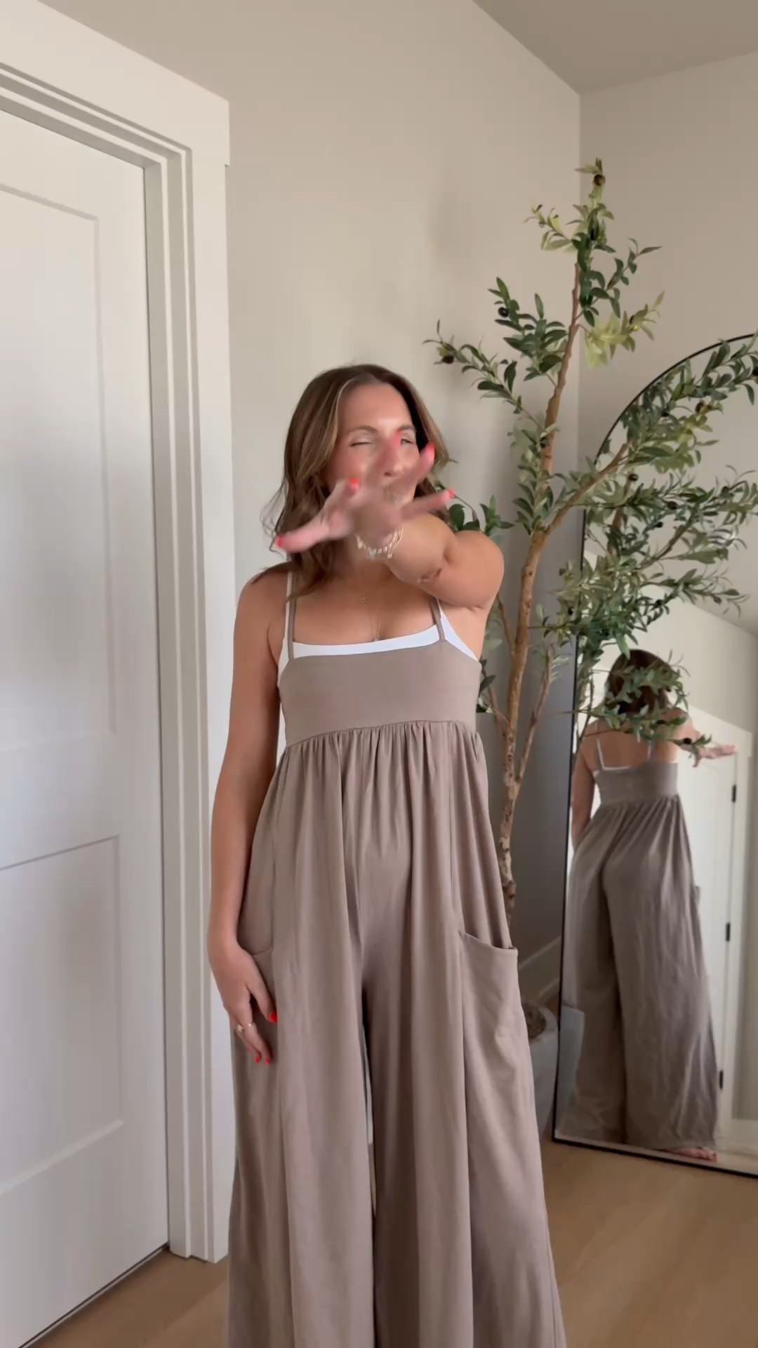 This jumpsuit is worth the hype! So stretchy, soft and comfortable! In wearing a xs