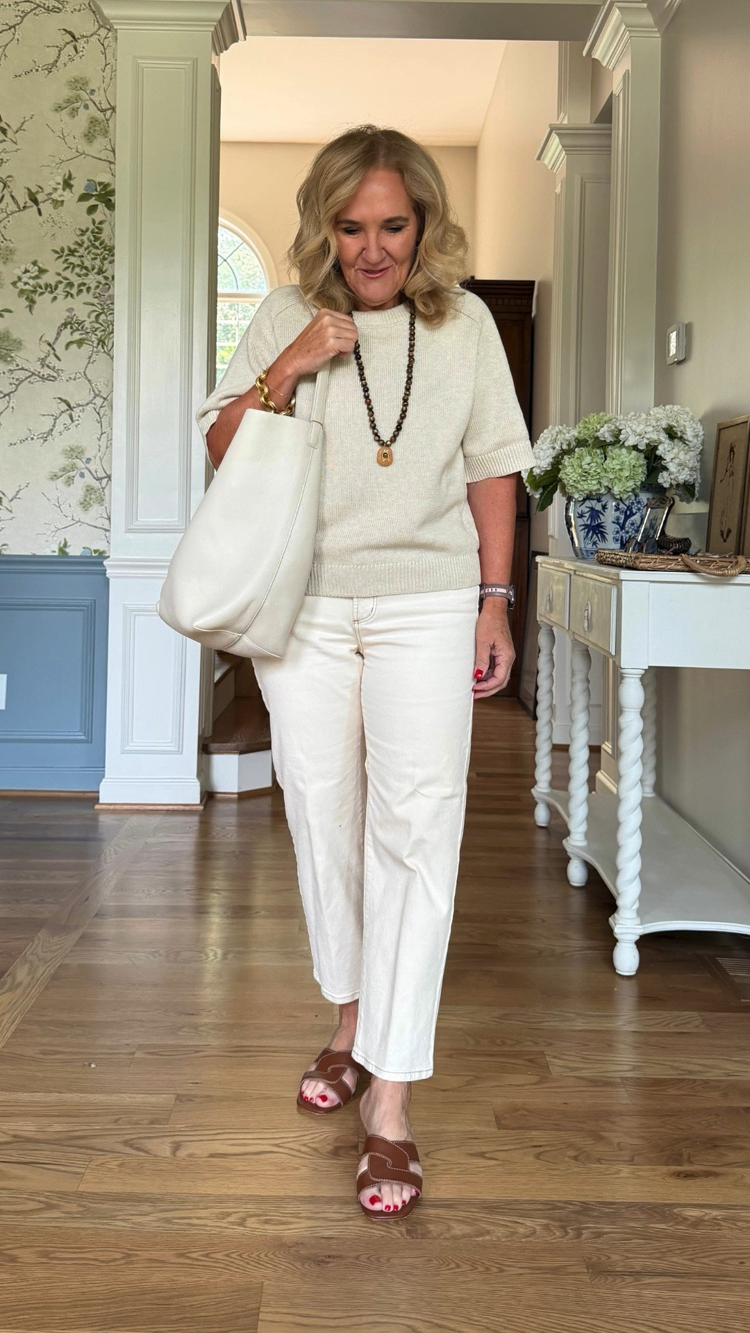 This cream knit top and white jeans are an easy, polished summer combination. Add brown sandals and a woven necklace for a relaxed look that feels pulled together.

💡 LTK MADE EASY
❤️ Heart = Support my posts!
🔖 Save = Get sale & restock alerts
📋 Lists = Keep favorites organized
📲 Share = Send lists and products to a friend. Hello, Christmas List!

#LTKootd #LTKTravel #LTKOver40