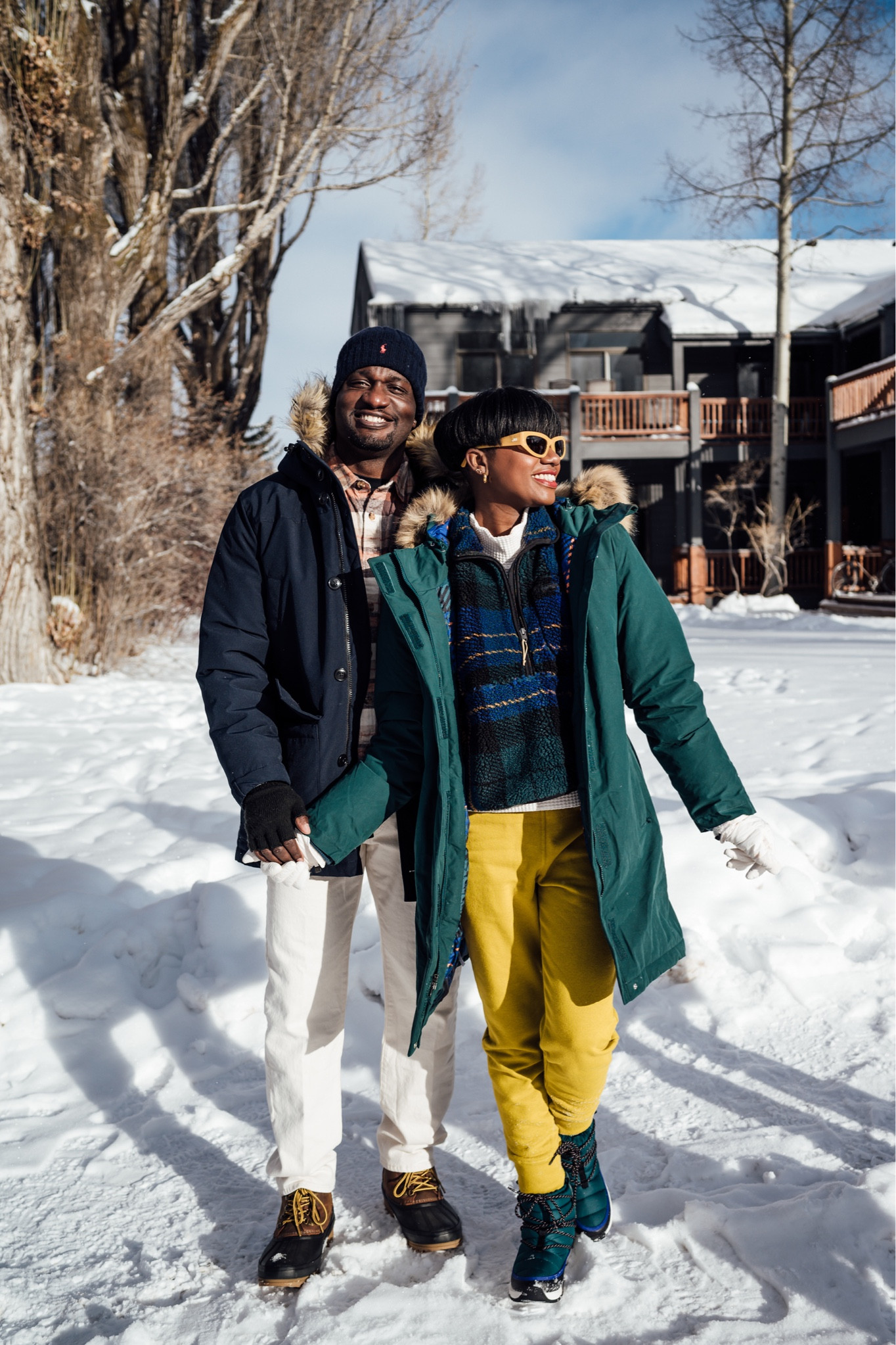 Outfit for a cold winter trip in Wyoming! Navy parka, north face green parka, plaid Sherpa pullover, water proof boots, yellow sunglasses, 90s white denim straight jeans and plaid flannel shirt  

#LTKHoliday #LTKSeasonal #LTKfamily