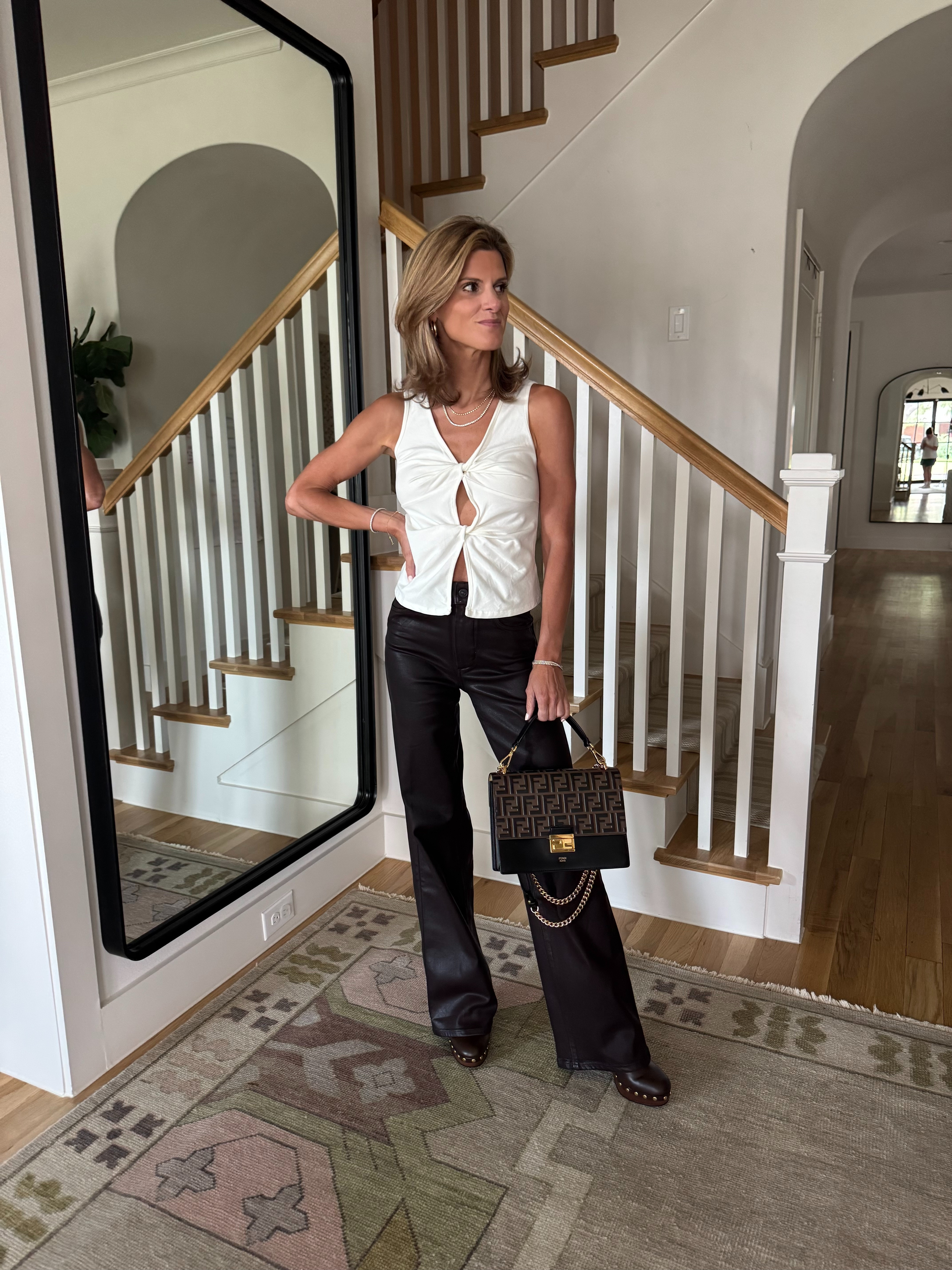 White Twist Tank: Reformation (wearing XS)
Brown Coated Wide Leg Jeans: Paige (TTS) (need to get hemmed)
Brown Studded Clogs: Zara
going out look/date night look/girls night look 

 