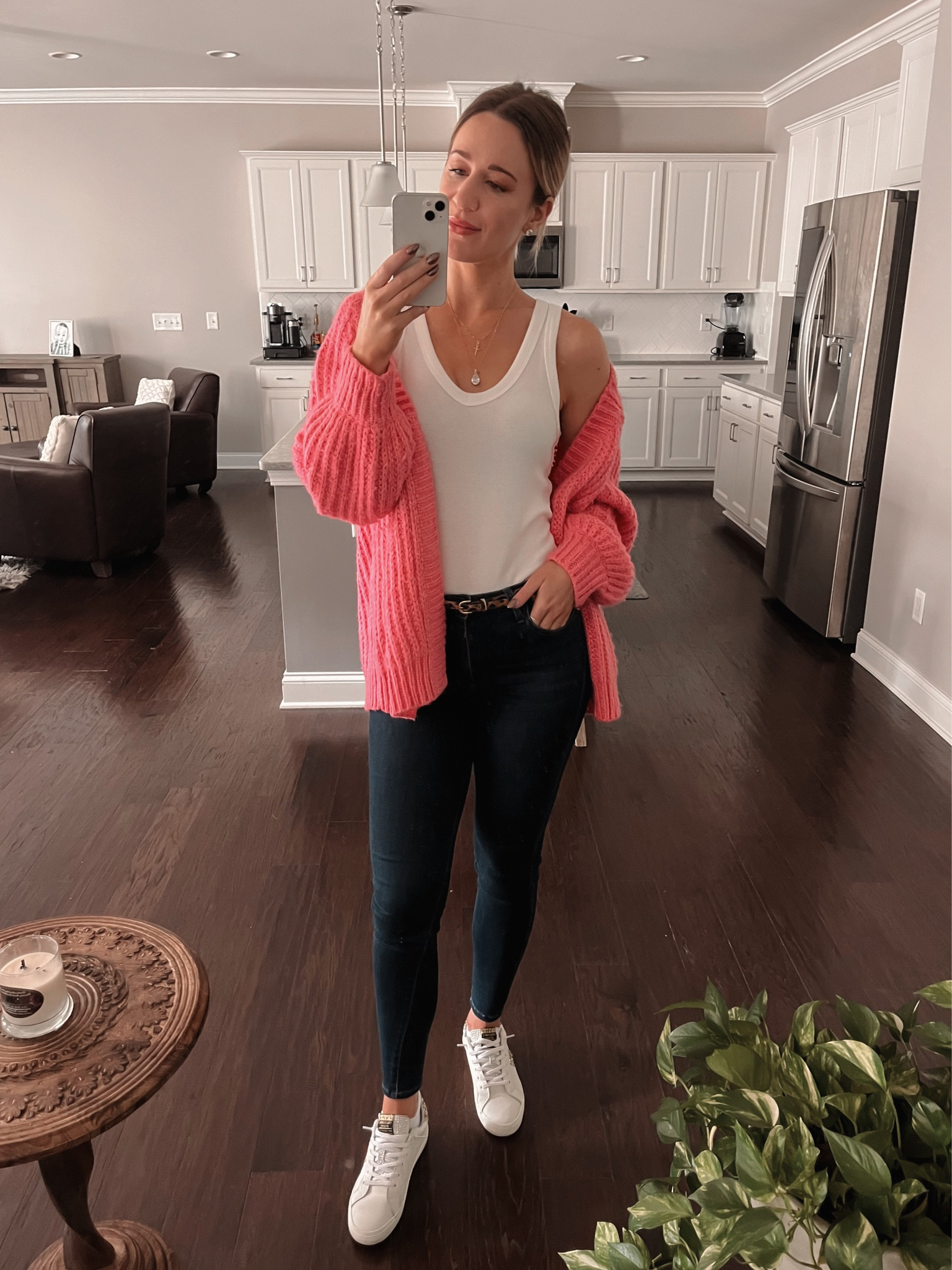 Here is a bright fall outfit idea for you! I love this chunky pink cardigan paired with my favorite skinny jeans and white sneakers. I bought most of this look at local boutiques, so I found equivalents to this look online! I’m an 8 in the shoes, a 26 in the jeans, and a small in the tops! 🙂

#LTKstyletip #LTKSeasonal #LTKfindsunder100
