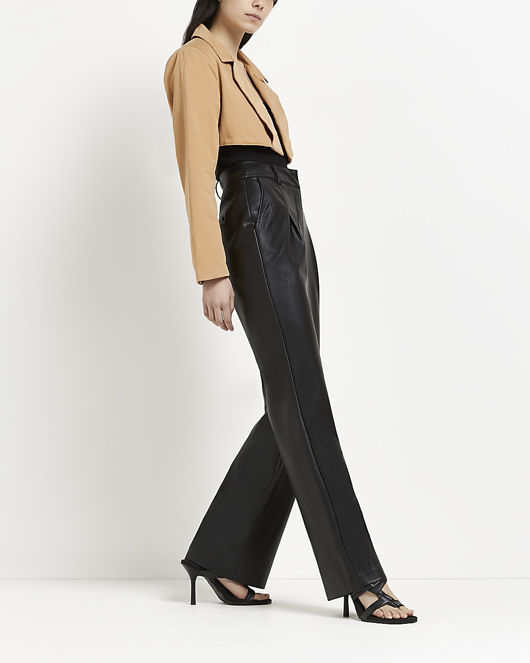 River Island Womens Black Faux Leather Wide Leg Pleated Pants | River Island (US)
