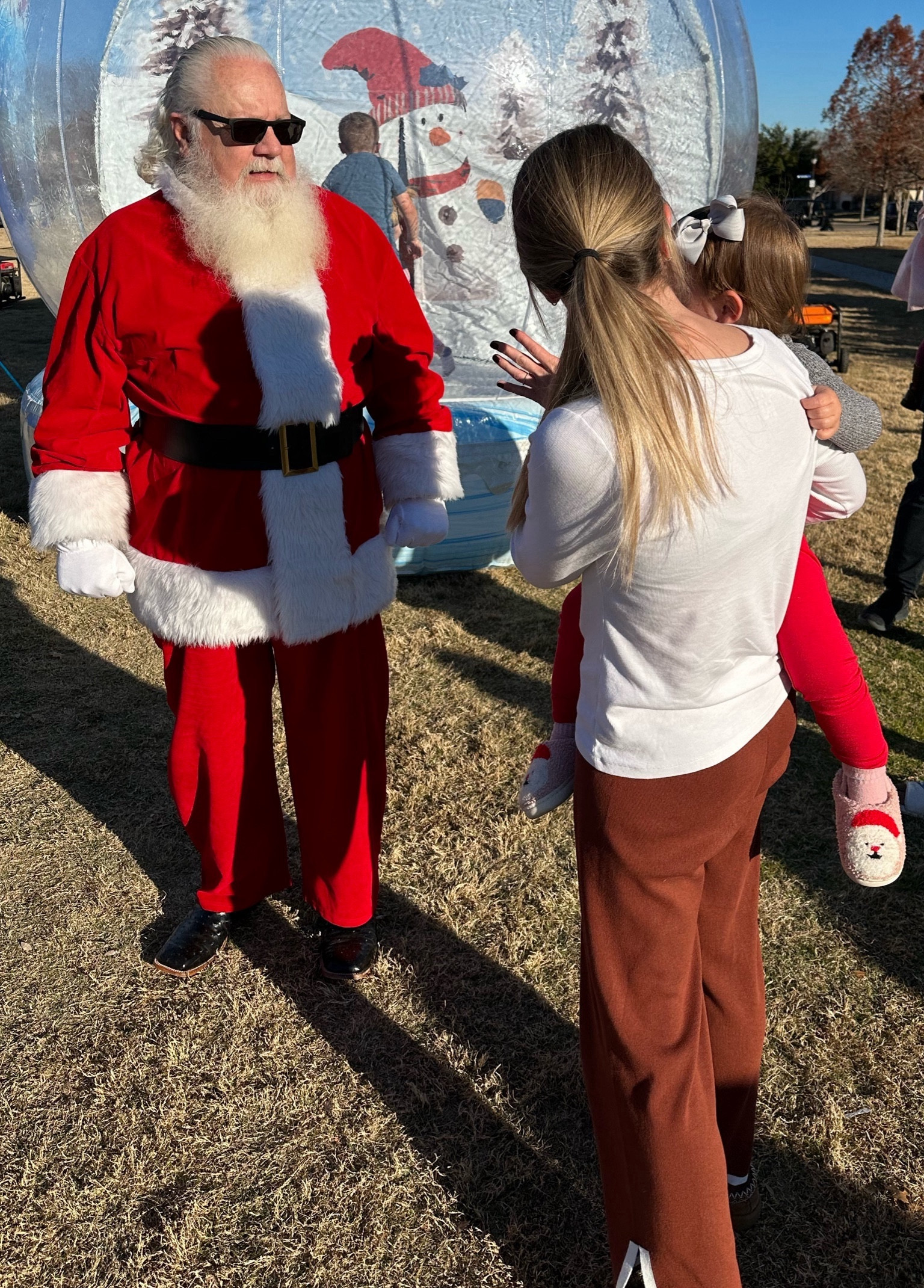 “santa pictures” LOL 

*pants are part of an Amazon set & true to size for us both. 

*my shirt is soft, stretchy & affordable. size down for a tighter fit. Wearing a medium, should have gone with my true size small. 

*Santa slippers are from Tullabee baby (can’t link them here) 





@Morgan.Speiser 
Christmas outfits, Santa pictures, holiday outfits, Christmas gift ideas, holiday party. 

#LTKSeasonal #LTKGiftGuide #LTKHoliday