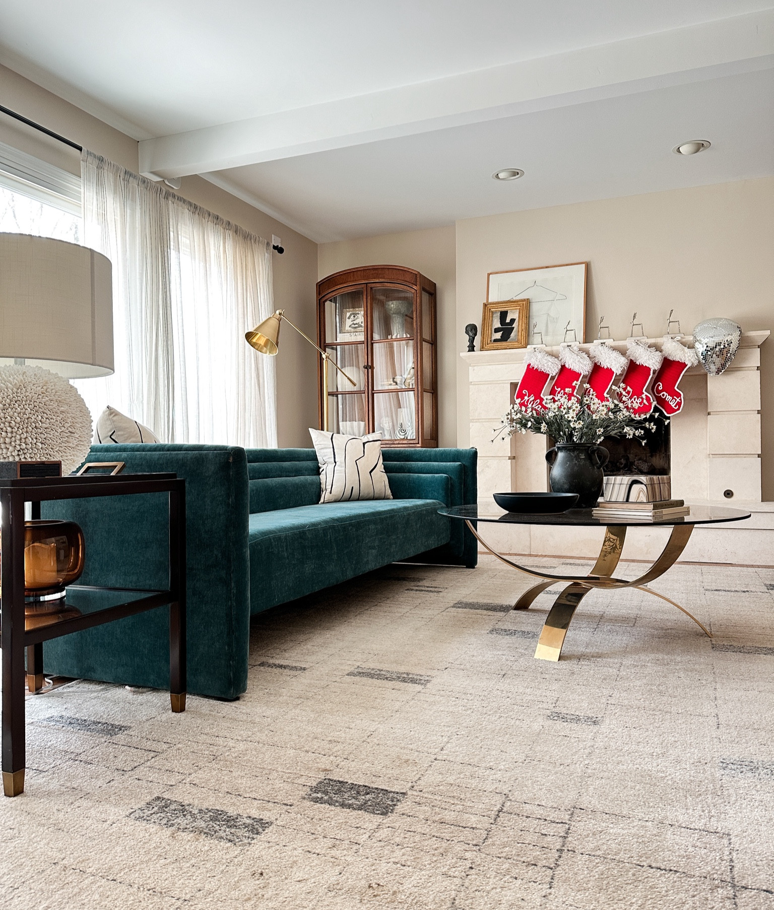 I added a bold pop of color in my living room with this jewel tone turquoise blue velvet couch! I love the art deco style lines and curves and it vibes with my eclectic modern decor style. The brass and glass coffee table is vintage but I sourced a few that have a similar look and feel. That shell encrusted lamp looks even more incredible in person and the side table has a multifunctional tray you can lift off the top. #vintagedecor #eclectic #eclecticdecor #homedecor #livingroominspo #livingroomdecor #moderncouch #sofa #modernsofa 

#LTKover40 #LTKstyletip #LTKhome