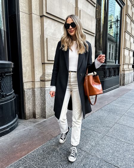 Fashion Jackson, NYC outfit, New York, white jeans, converse sneakers, winter outfit, Celine bucket bag, black coat. Use code JACKSON15 for a discount on my sweater #sneakers #newyork #jeans

#LTKstyletip #LTKunder100