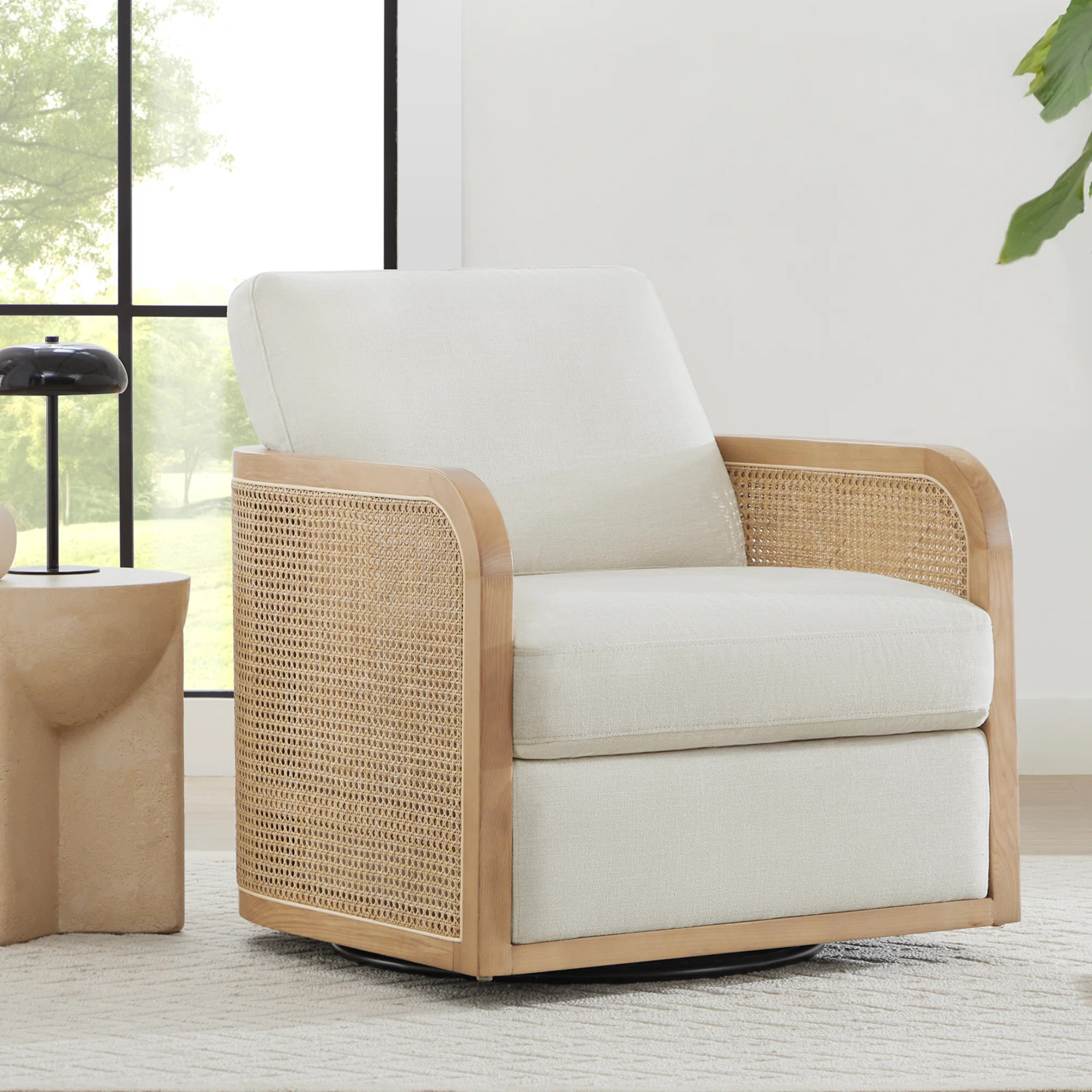 Juliette Upholstered Natural Cane Swivel Barrel Chair | Wayfair North America