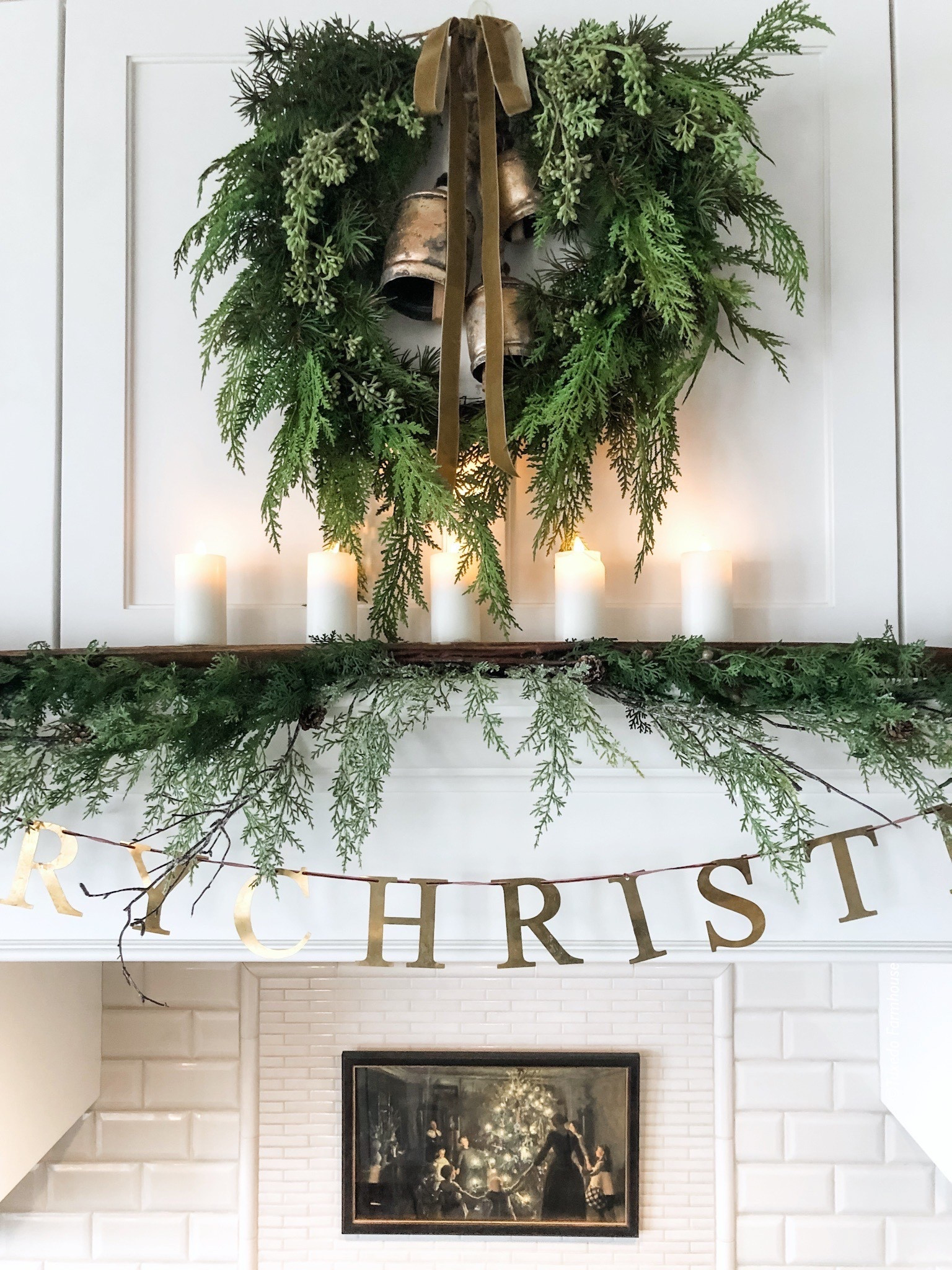 A pretty wreath, vintage bells and a little ribbon are all you need to put together a gorgeous wreath for your range hood  

#LTKHome #LTKSeasonal #LTKFindsUnder50