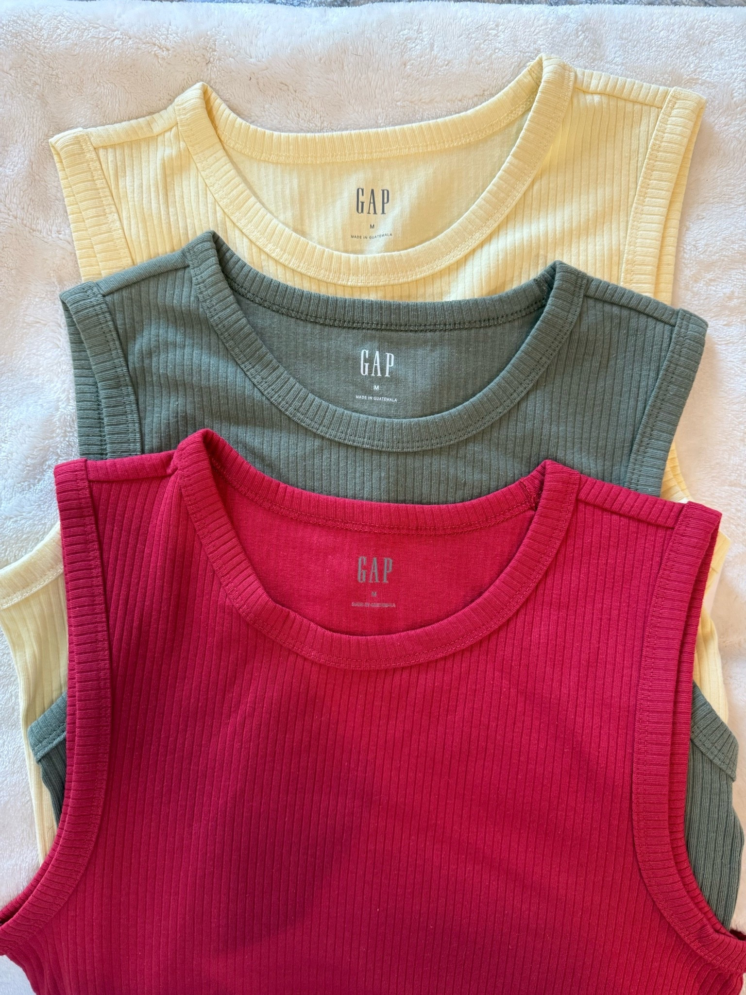 Absolutely love the fit of these GAP ribbed tank tops! I had to grab these summer colors, as well as black & white! Currently on sale!!

#LTKootd #LTKSaleAlert