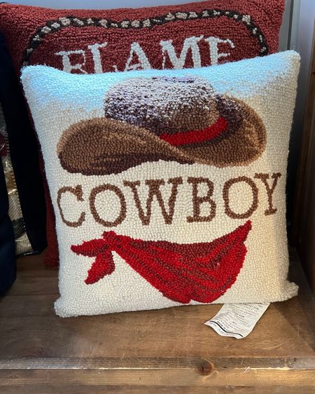 Saw this cute wool hooked throw pillow in Nashville. Accessory for a western themed bedroom or guest room. 

#LTKhome #LTKFind #LTKkids