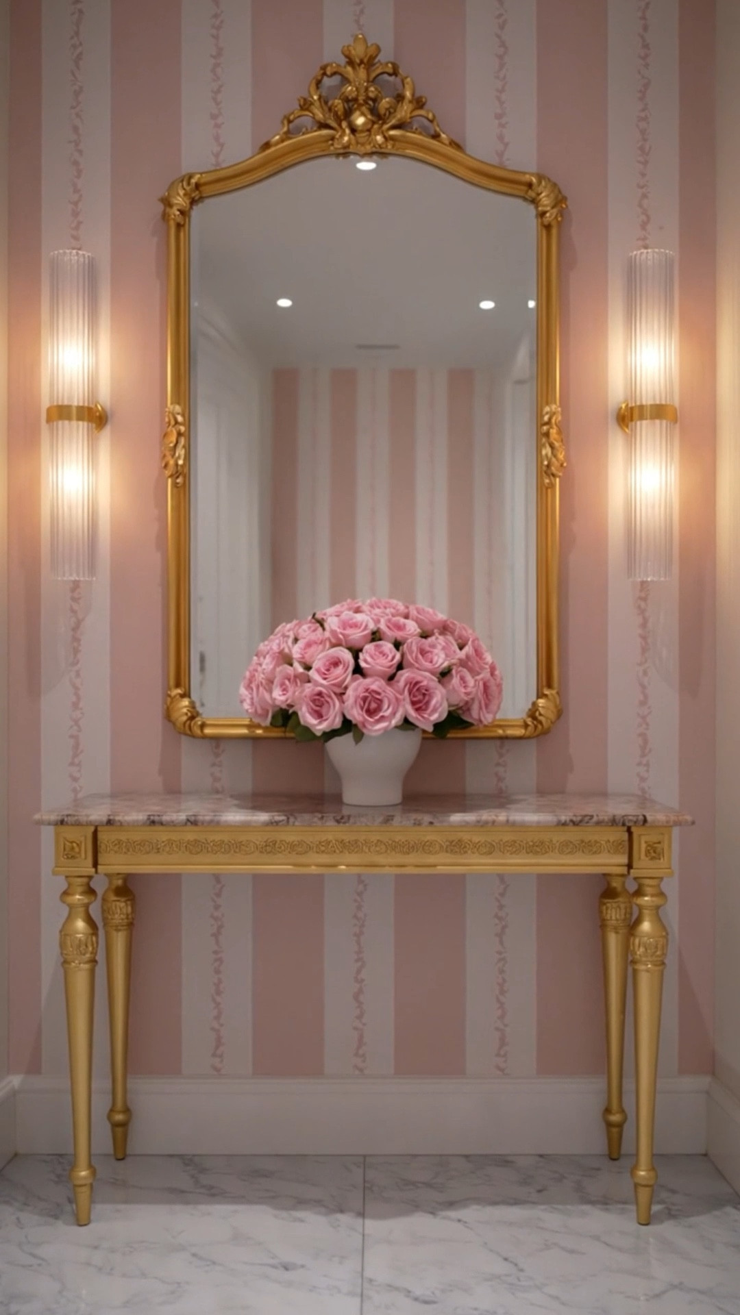 Imagine coming back home to this entry after a long day — everything softly lit, calm, and beautifully composed.

A mix of new classical and modern creates the balance here. The timeless console and mirror ground the space, while this bold pink stripe from brings a fresh, updated edge — wider, cleaner, and quietly statement-making.

Finished with a romantic floral moment that feels effortless yet elevated — the kind of everyday detail that makes a home feel complete.

#entryway #console #mirror #wallpaper #floralarrangement #tabletop #homedecor #interiordesign #modernclassic #classicstyle

#LTKSaleAlert #LTKHome #LTKFestival
