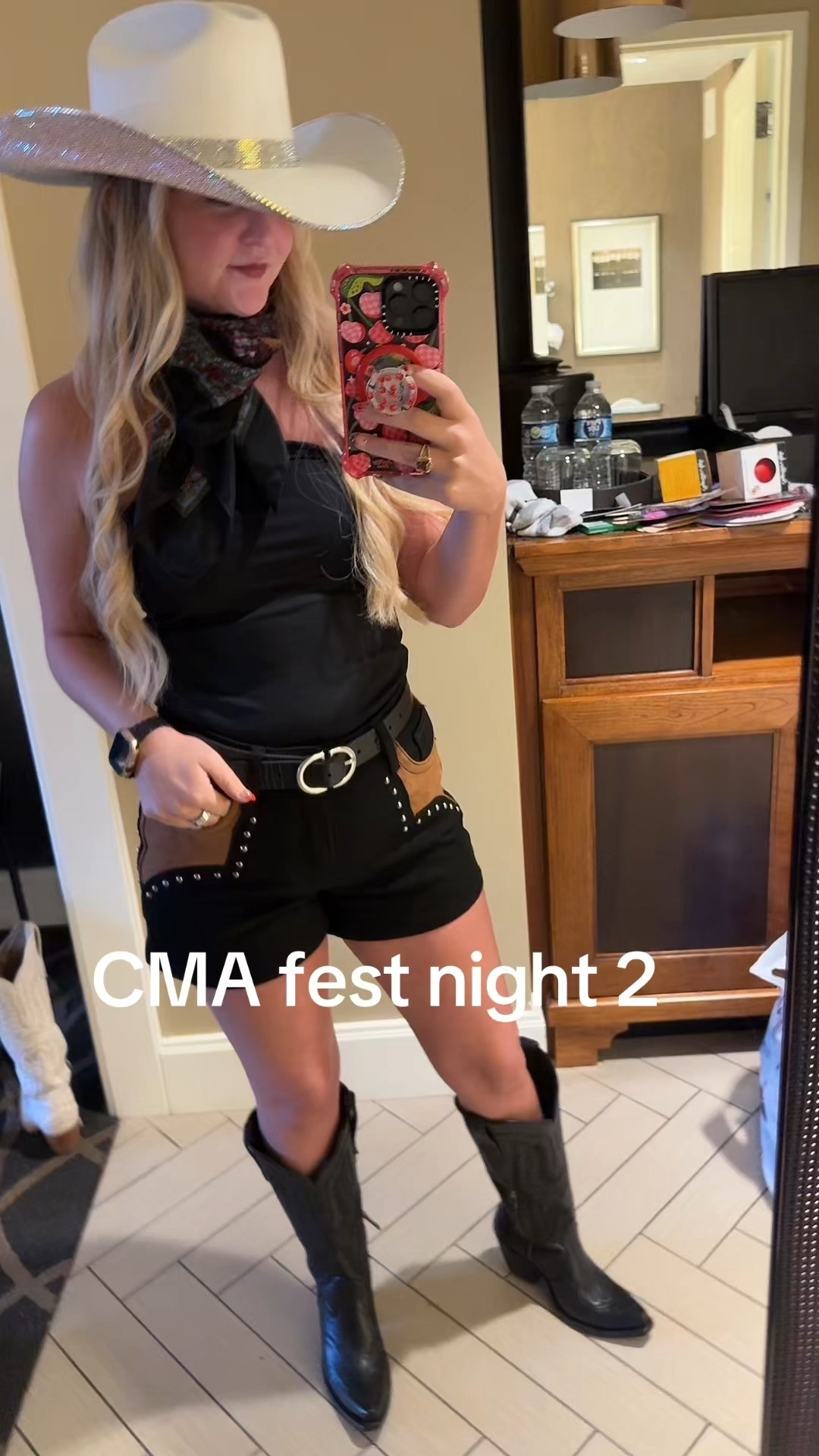 CMA Fest Night 2 Outfit! 🤠
Top: Steve Madden (XS)
Shorts: Rock and Roll Denim  (26)
Boots: Ariat 
Hat: Rhinestone Cowgirl 
Scarf: Free People  