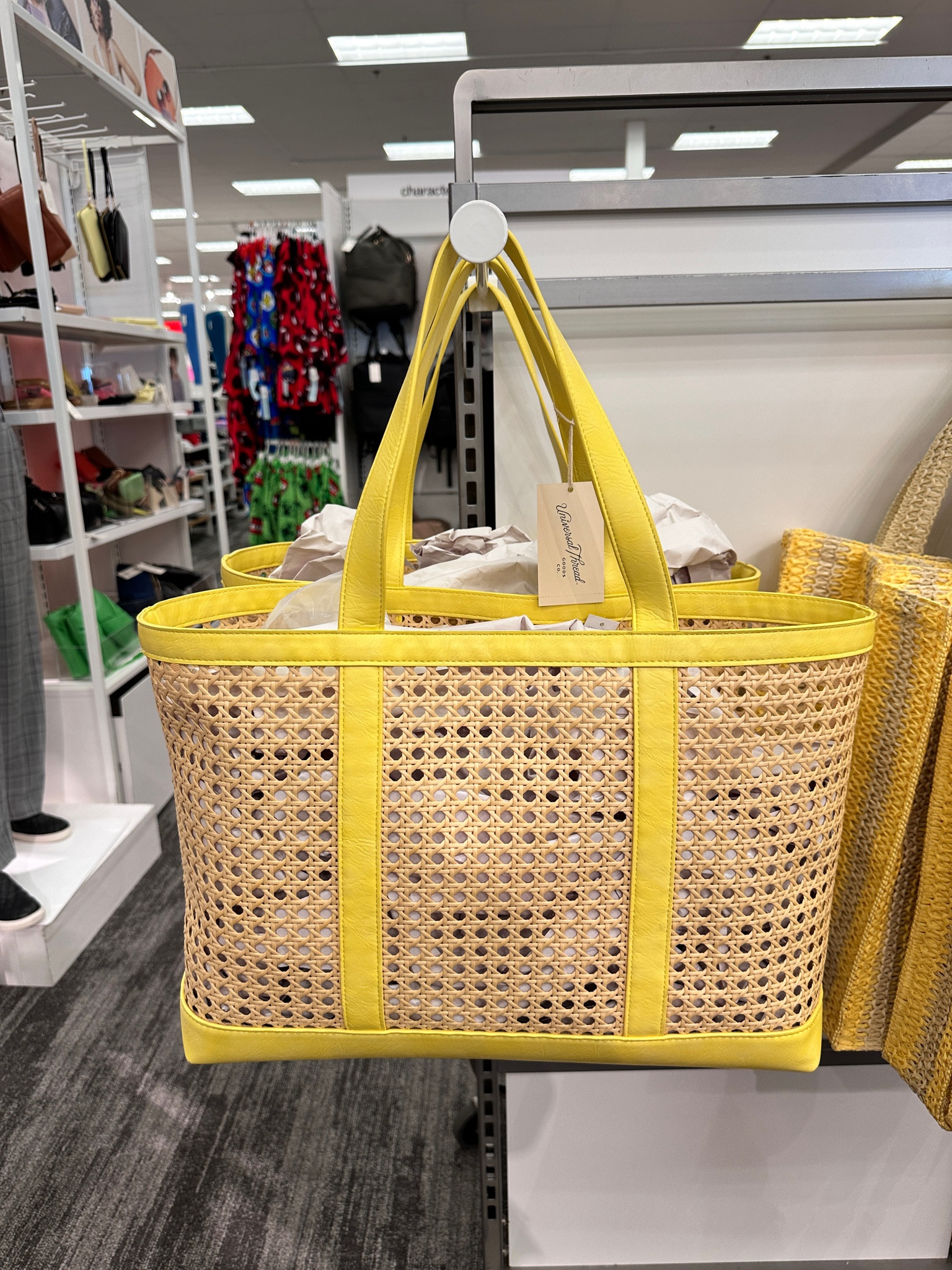 Cutest tote bag from Target with yellow trim! Perfect for spring and summer and I love the cane detail! Would be great for the beach or just getting around! Such a great price too! Found it at target! 

#LTKstyletip #LTKfindsunder50