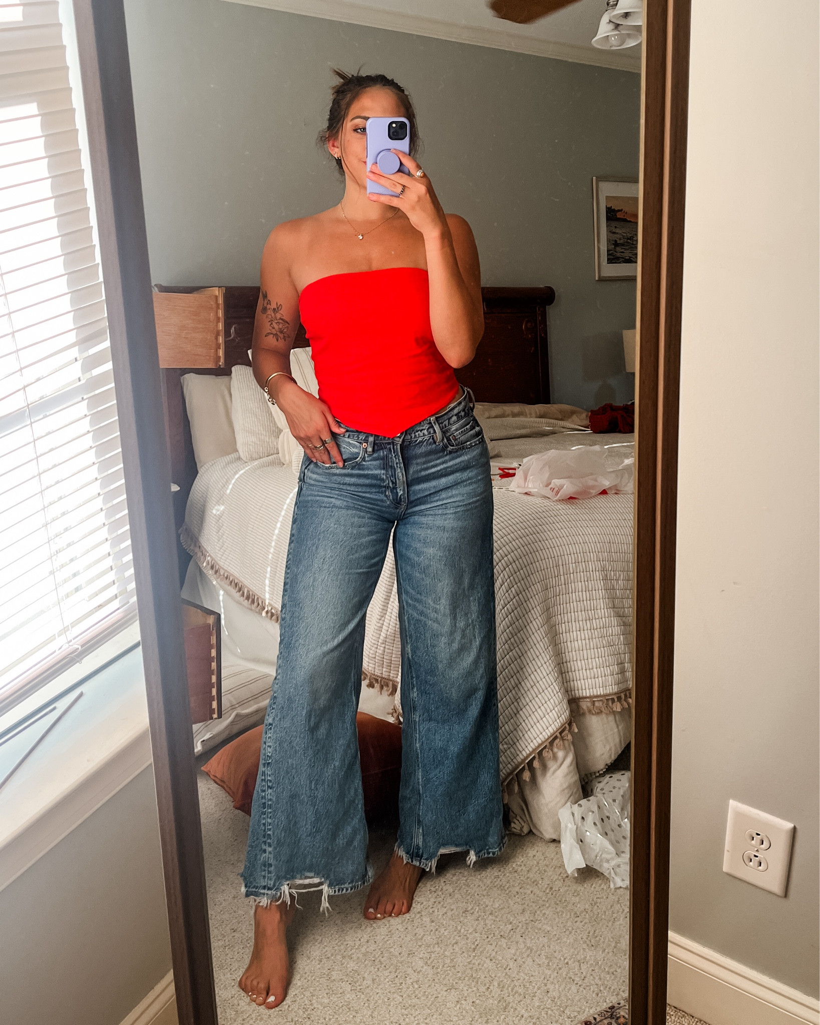 In love with this open back tie top! Only $20 from Target and super flattering! These are also my favorite wide leg jeans - wearing a size 6! If you’re in between sizes do down! 