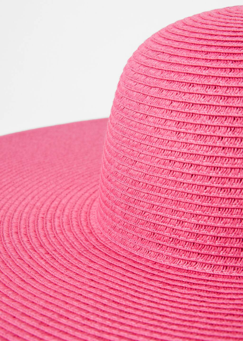 This straw hat features a rounded crown and a flat, extra-wide brim, crafted in a vibrant hue tha... | & Other Stories - US
