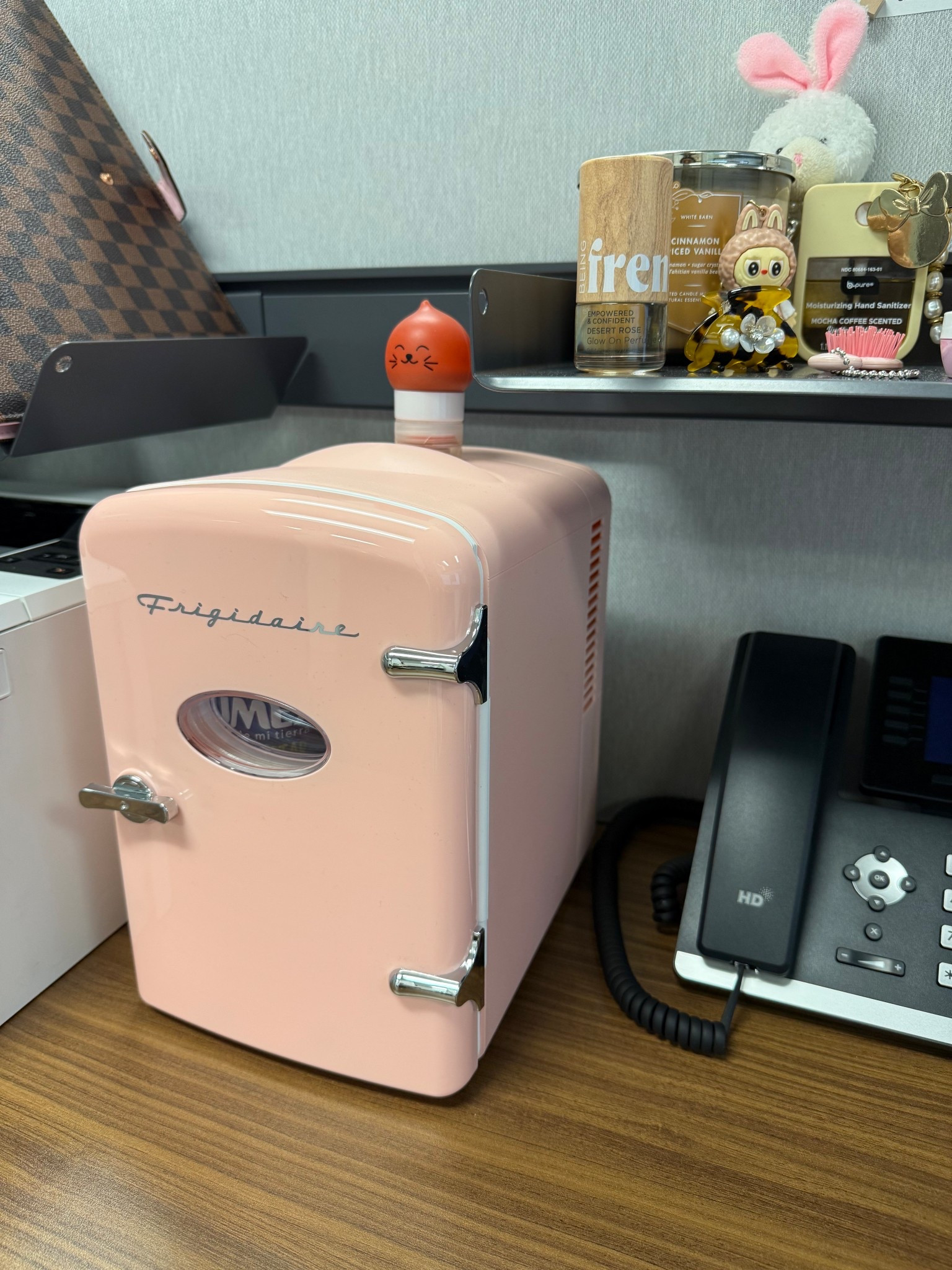 This has been a great little fridge for my desk at work. It can fit 4 regular water bottles, 4 Red Bulls and 4 soda cans. It keeps my drinks nice and cold. I am petty impressed 💖