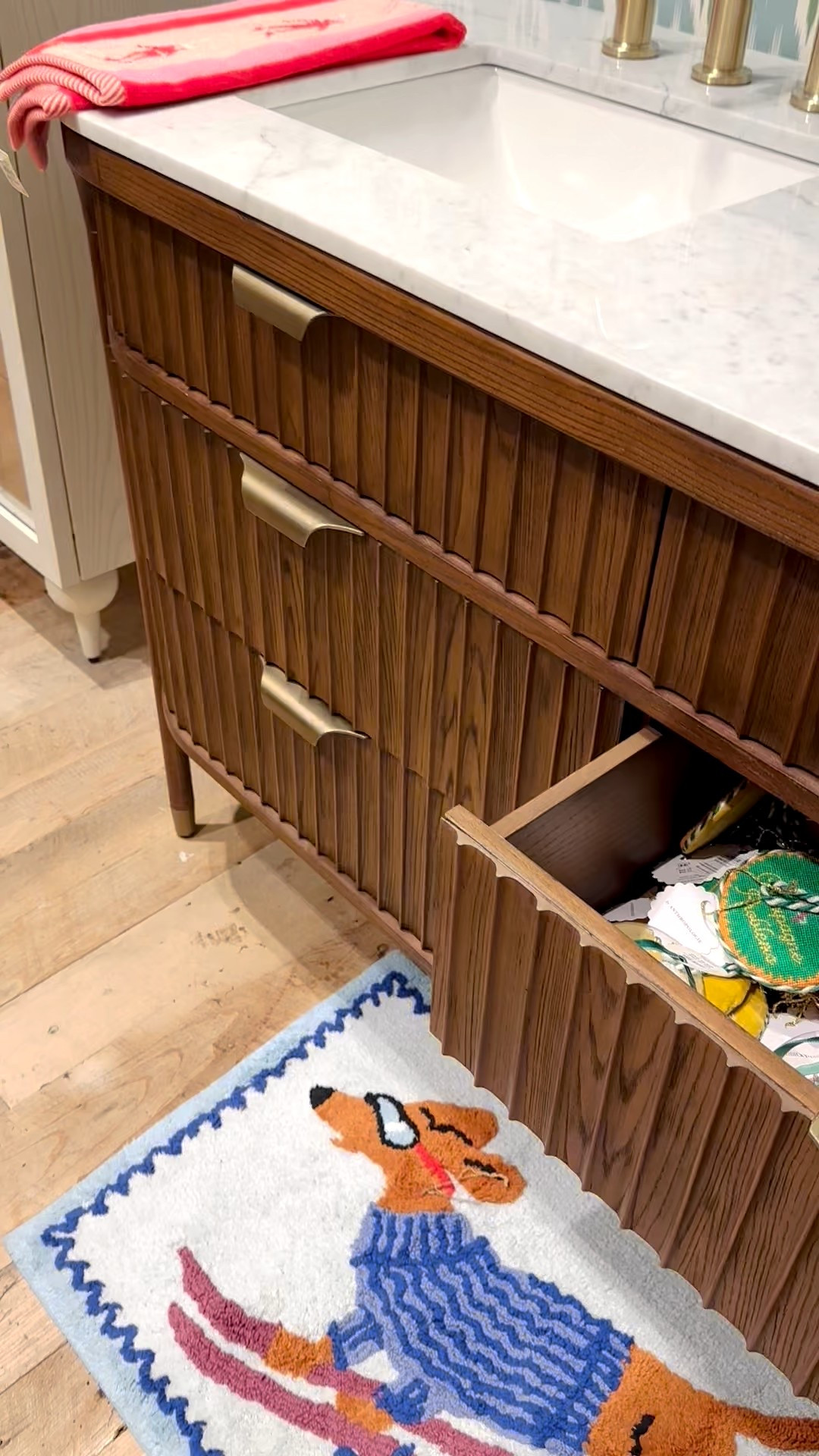 Start your morning in style with this modern-chic Carrara marble top  bath vanity — classic brass pulls, tapered legs, and reeded detailing. And of course, who wouldn’t love the multi-drawer storage?”


#BathVanity #BathroomDesign #ModernChic #InteriorDesign #BrassHardware #TaperedLegs #ReededDetails #StorageGoals #HomeStyle #LuxuryBathroom #VanityLove

#LTKHome #LTKCyberWeek #LTKSaleAlert