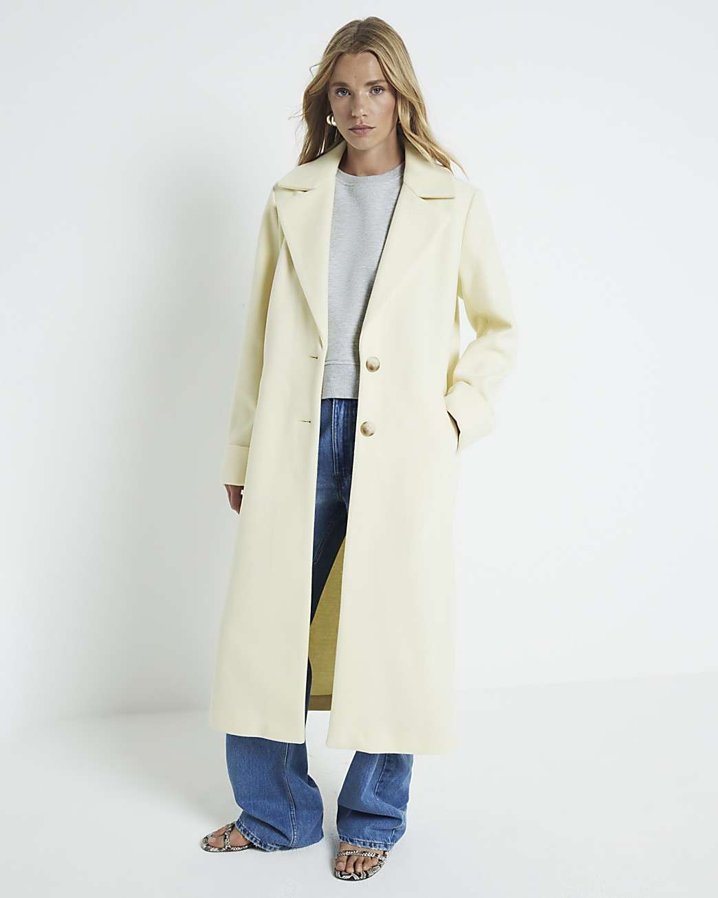 Yellow button up longline coat | River Island (UK & IE)