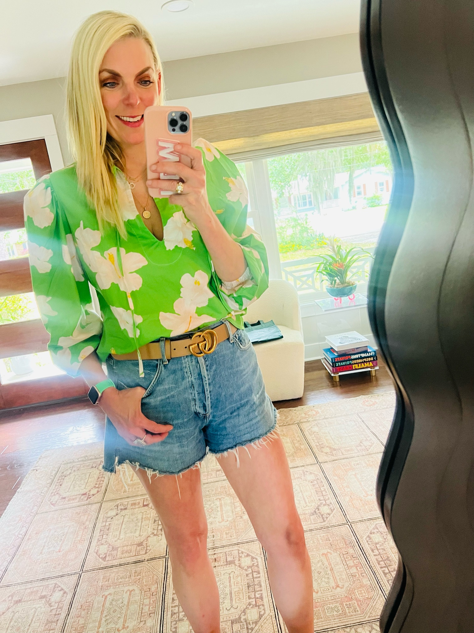Wearing small in blouse 29 in shorts 